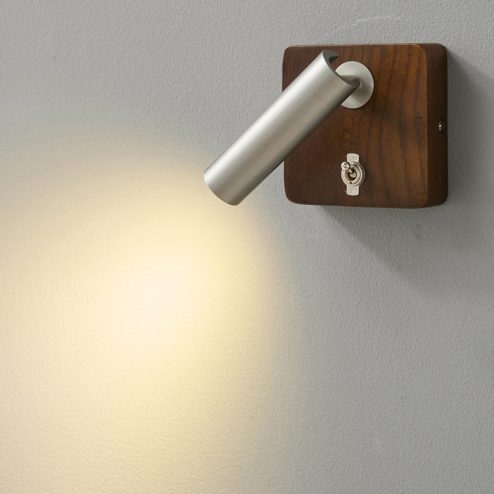 Close-up of the ash wood body of the Enna Wall Lamp.