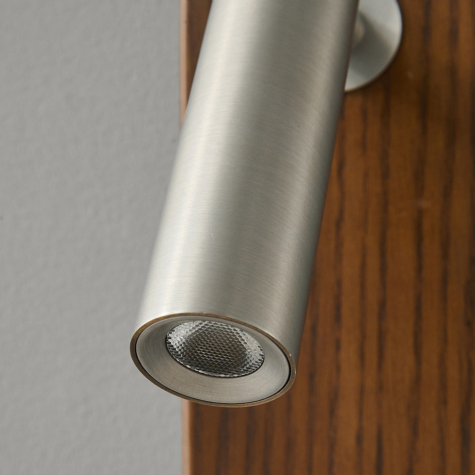 Angled view of the Enna Wall Lamp in antique silver finish.