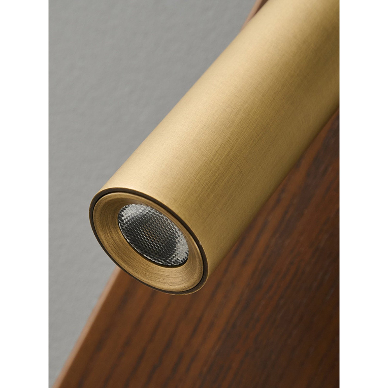 The glare-free glow from the integrated LED of the Enna Wall Lamp.