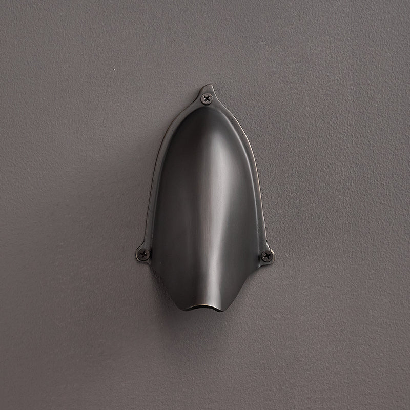 Enoki Wall Lamp casting light upwards.