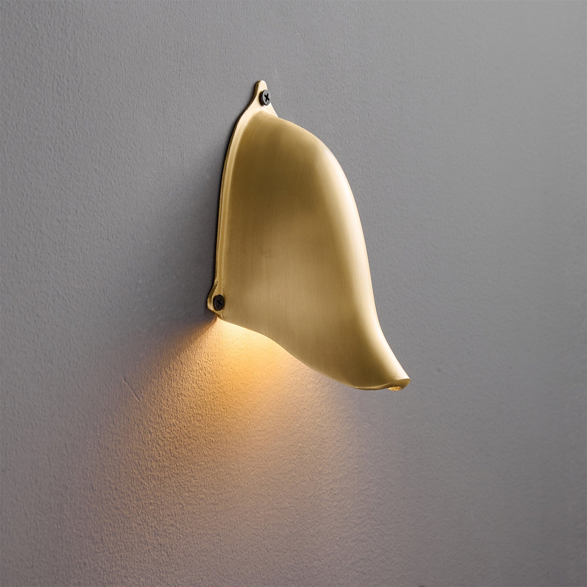 Enoki Wall Lamp in Silver, unlit, showing its metallic sheen.