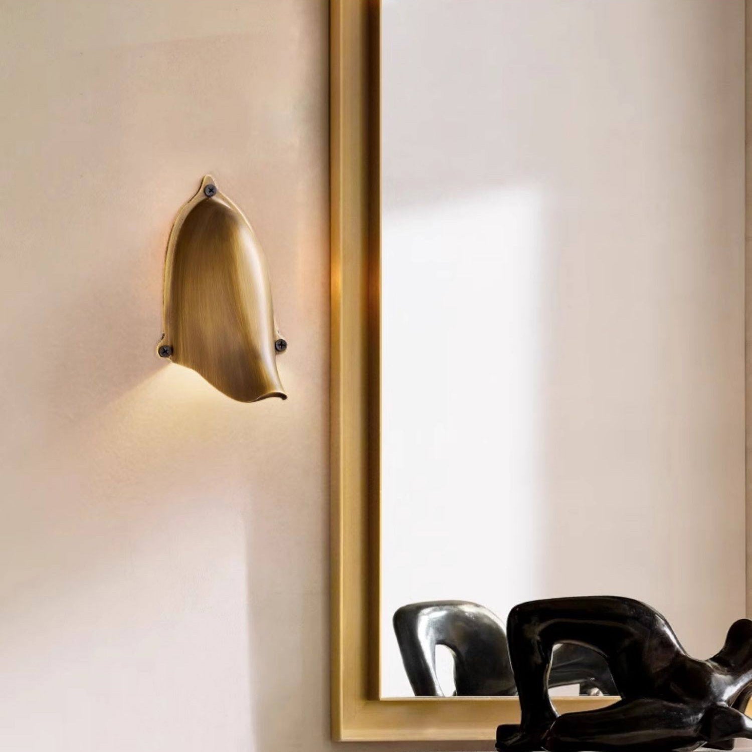Side view of the Art Deco inspired Enoki Wall Lamp in Matte Black.