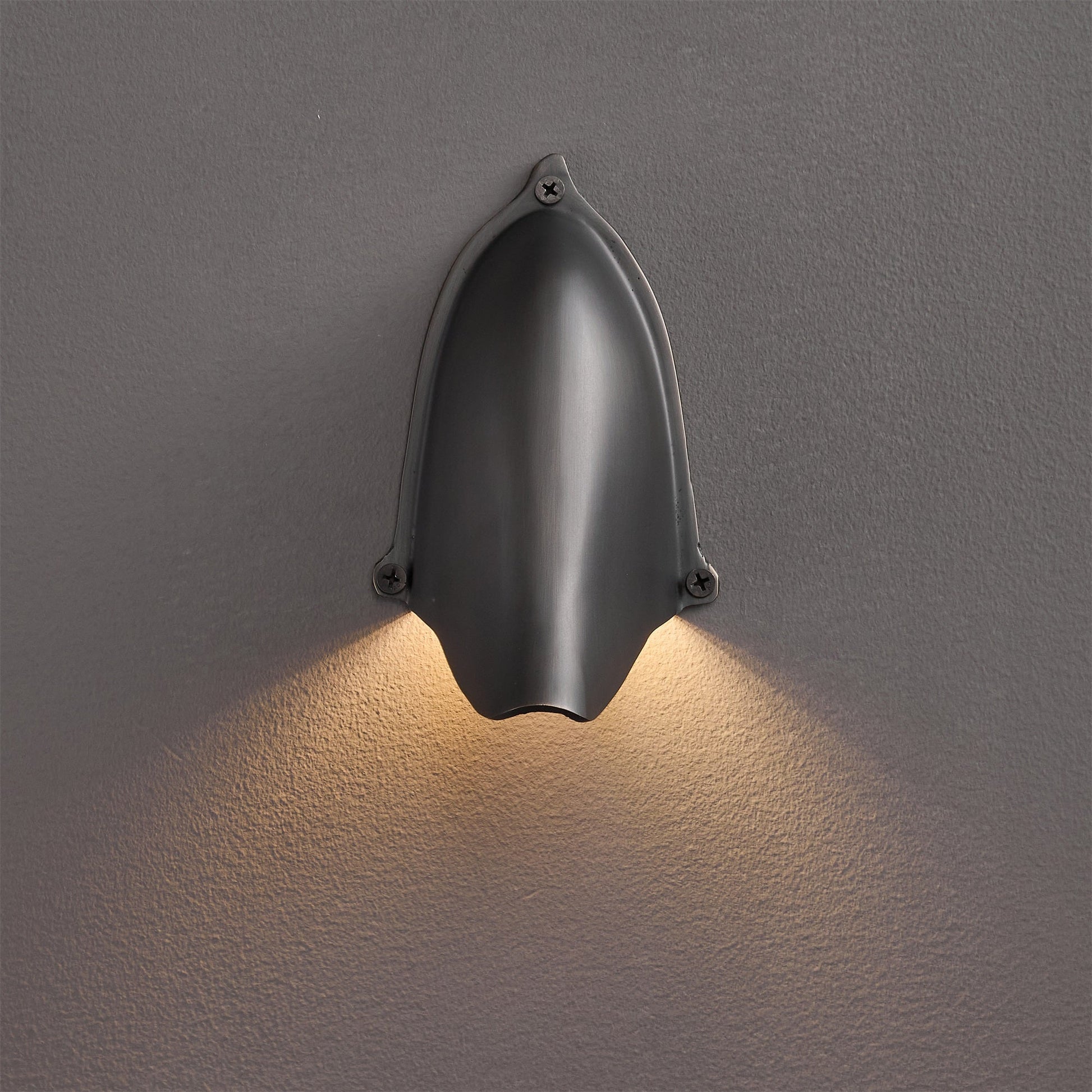 Enoki Wall Lamp casting light downwards.
