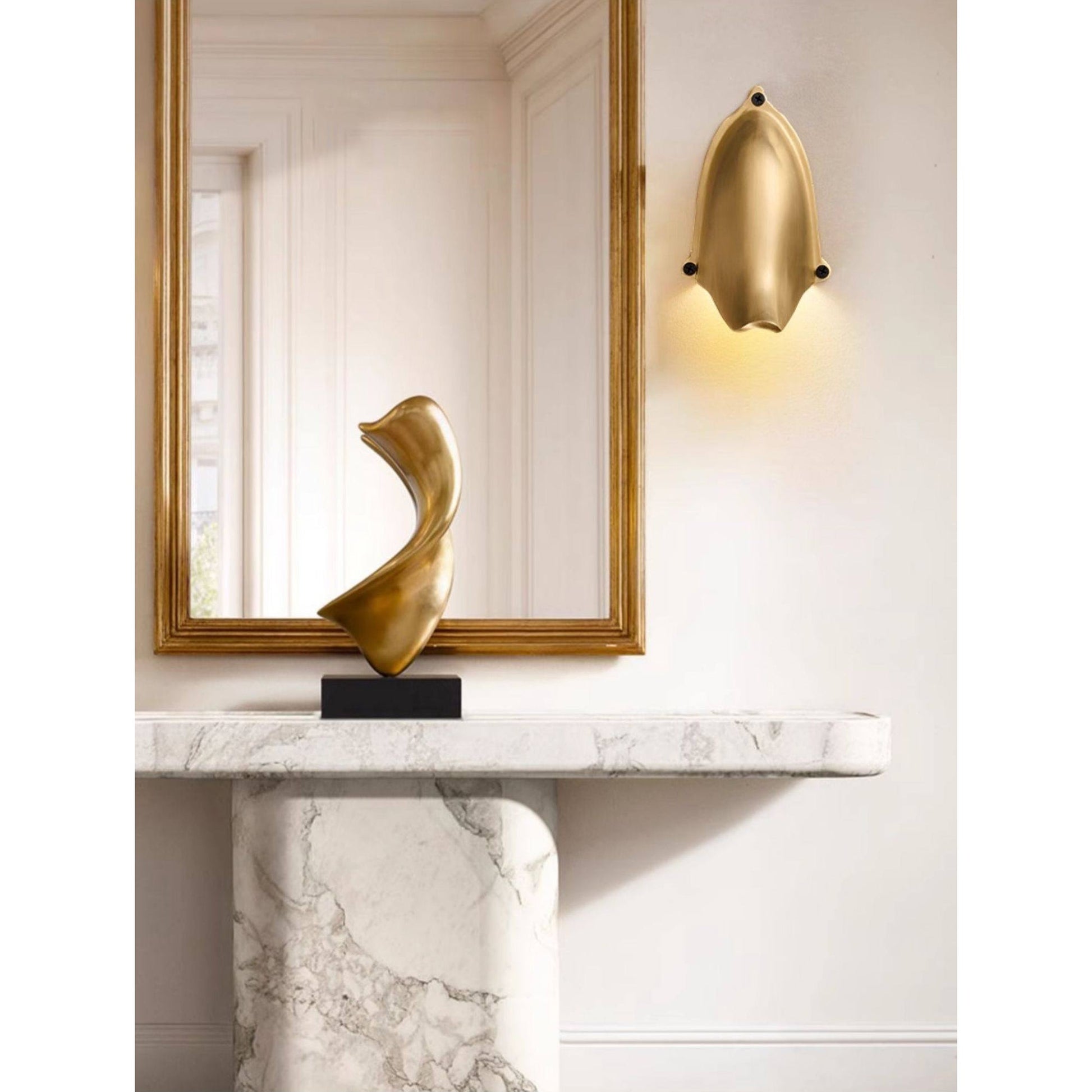 Enoki Wall Lamp in Glossy Copper, shown illuminated.