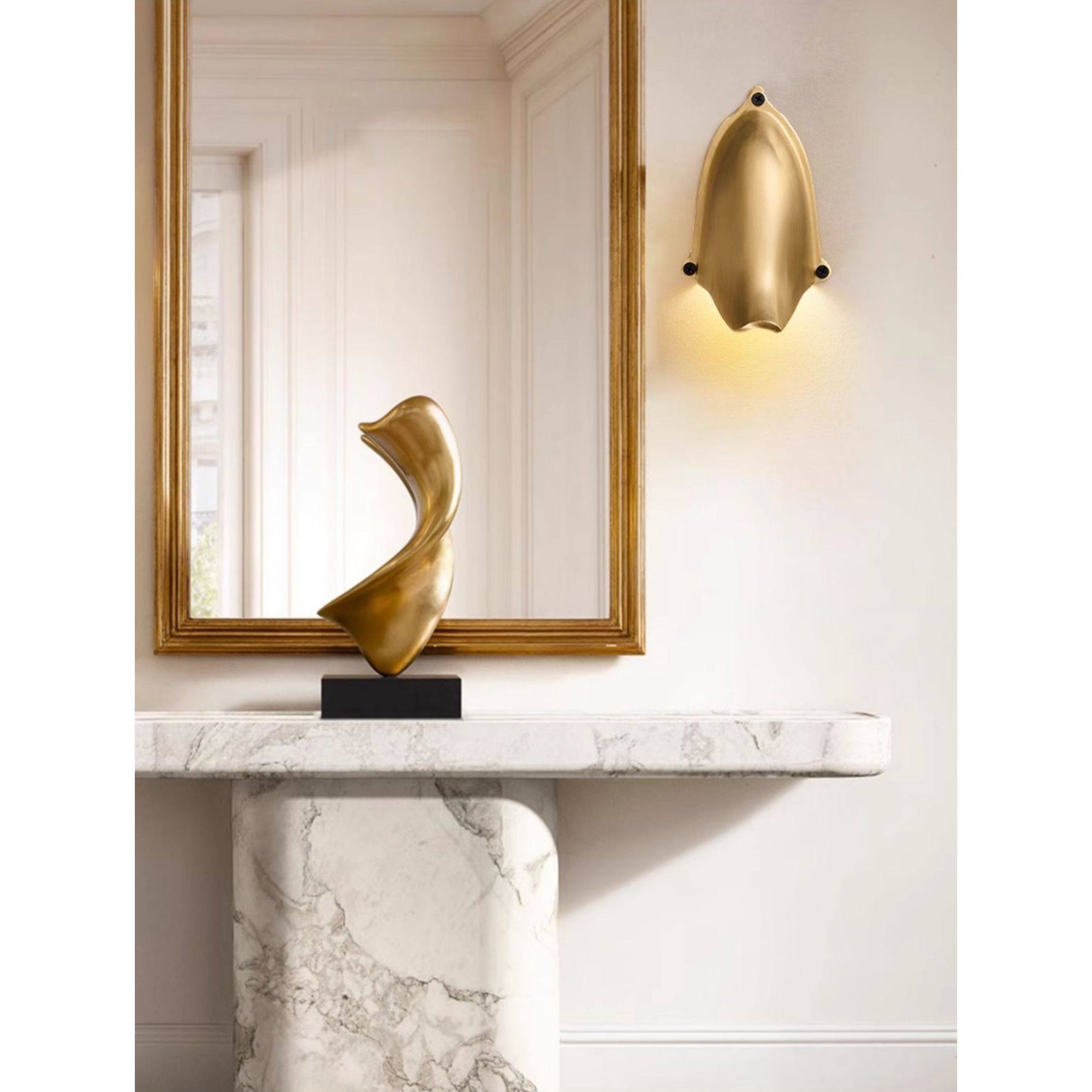 Enoki Wall Lamp in Glossy Copper, shown illuminated.