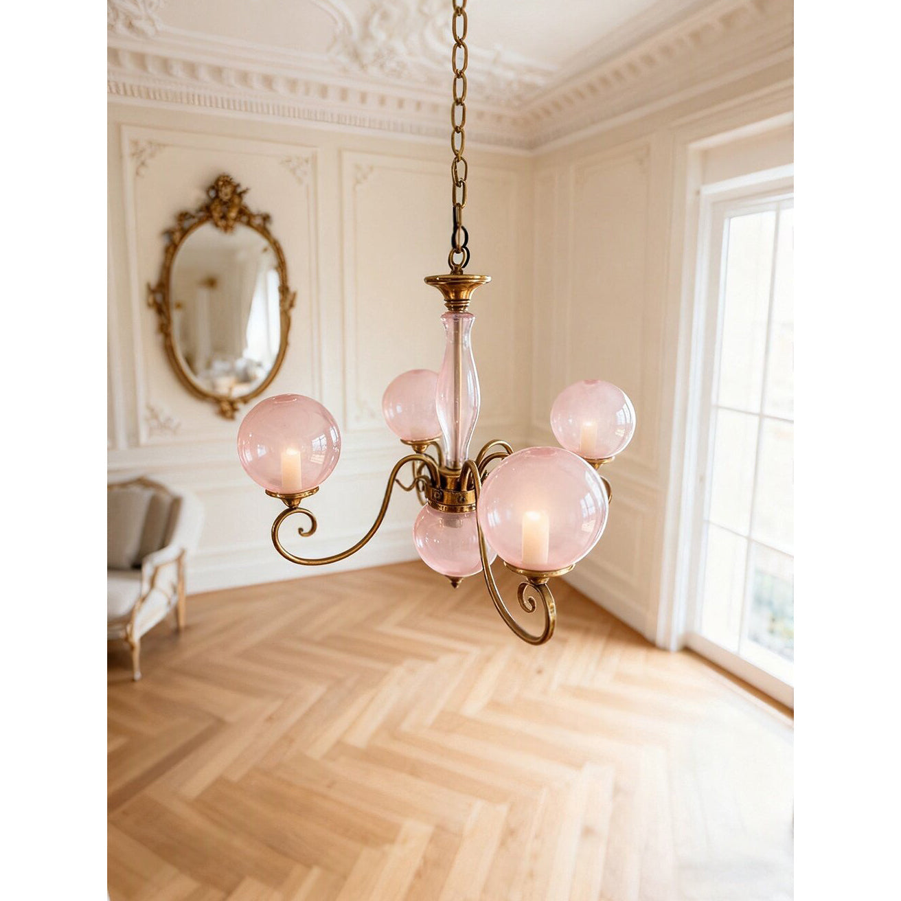A lifestyle image of the Evelyn Chandelier in a traditional sitting room.