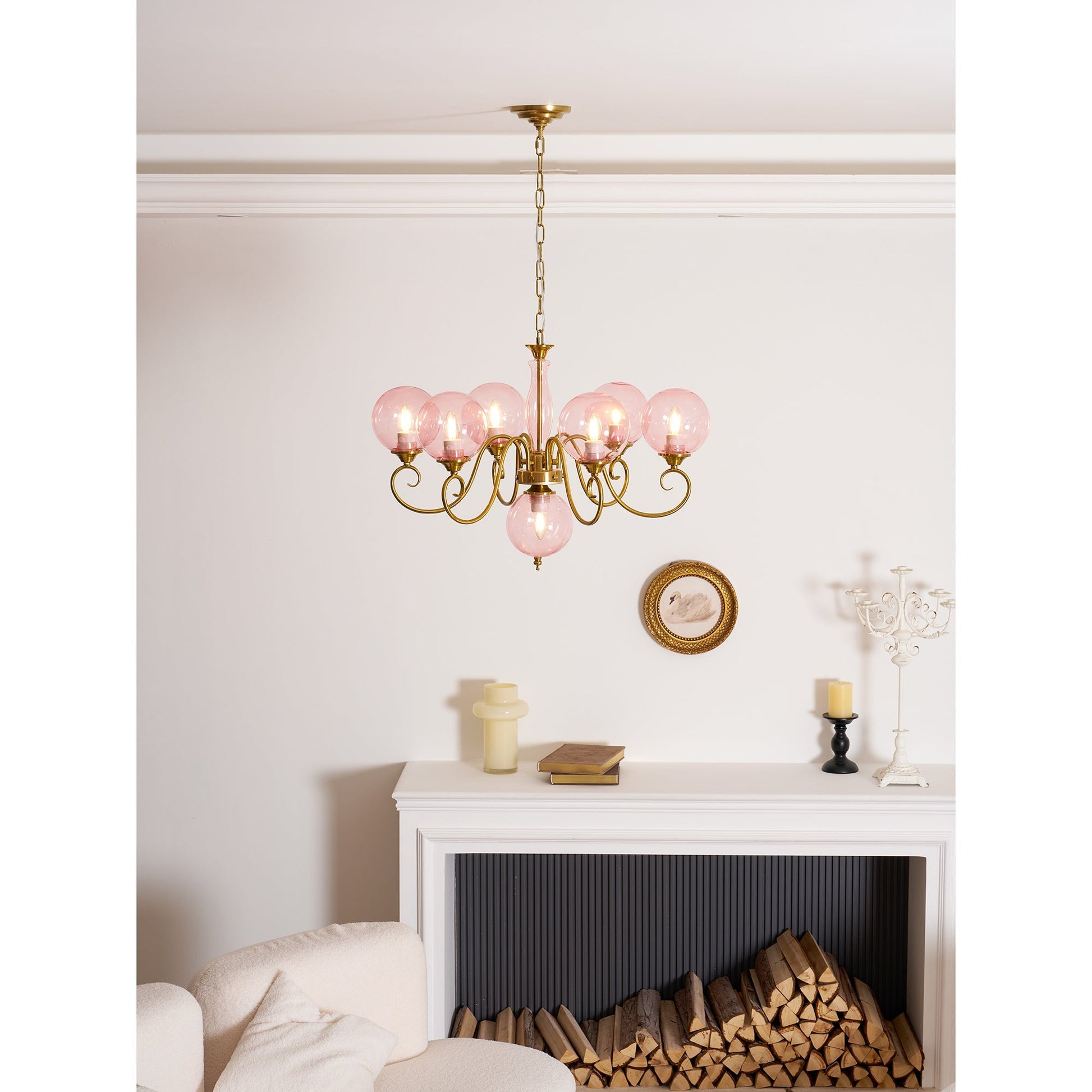 Evelyn Glass Chandelier with blush pink globes, unlit.