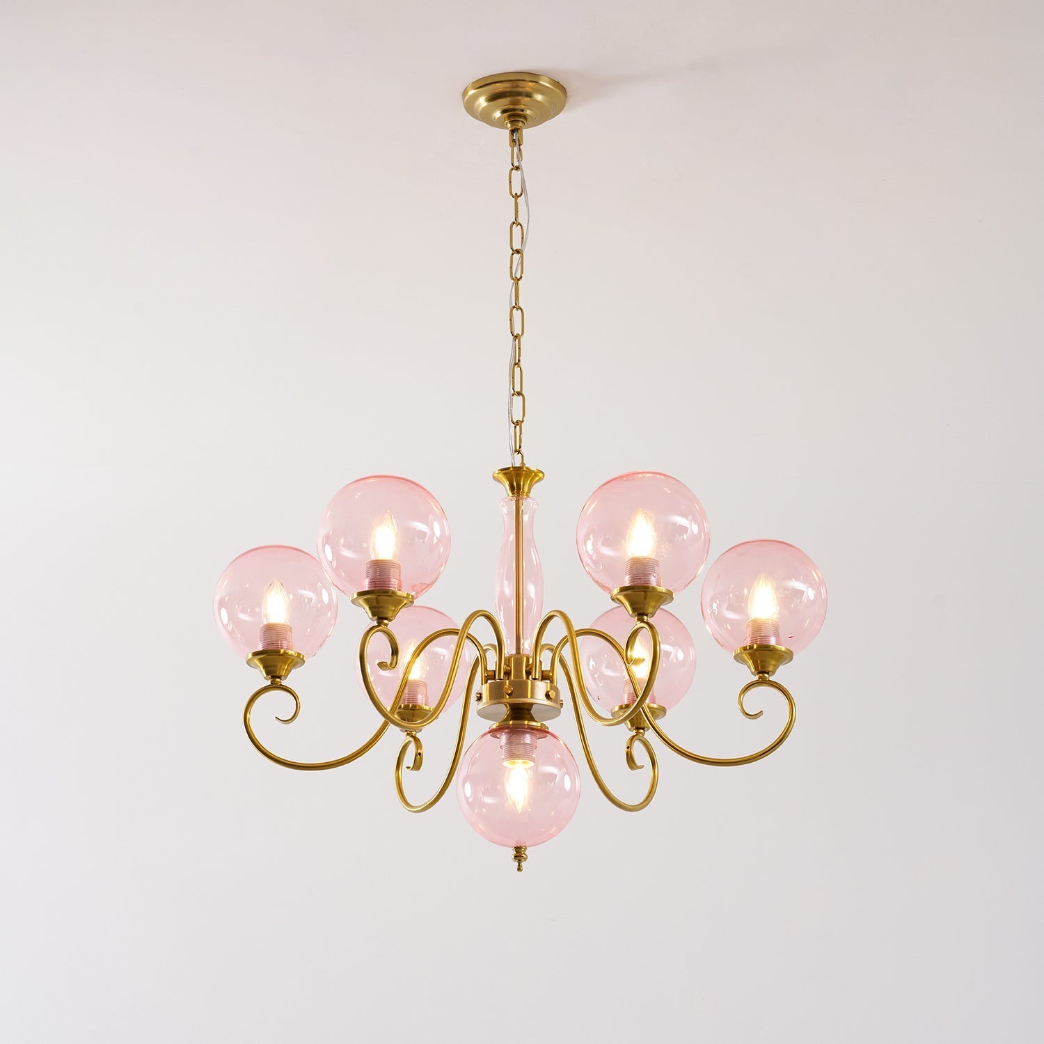 The 6+1 head chandelier in a rectangular dining room.