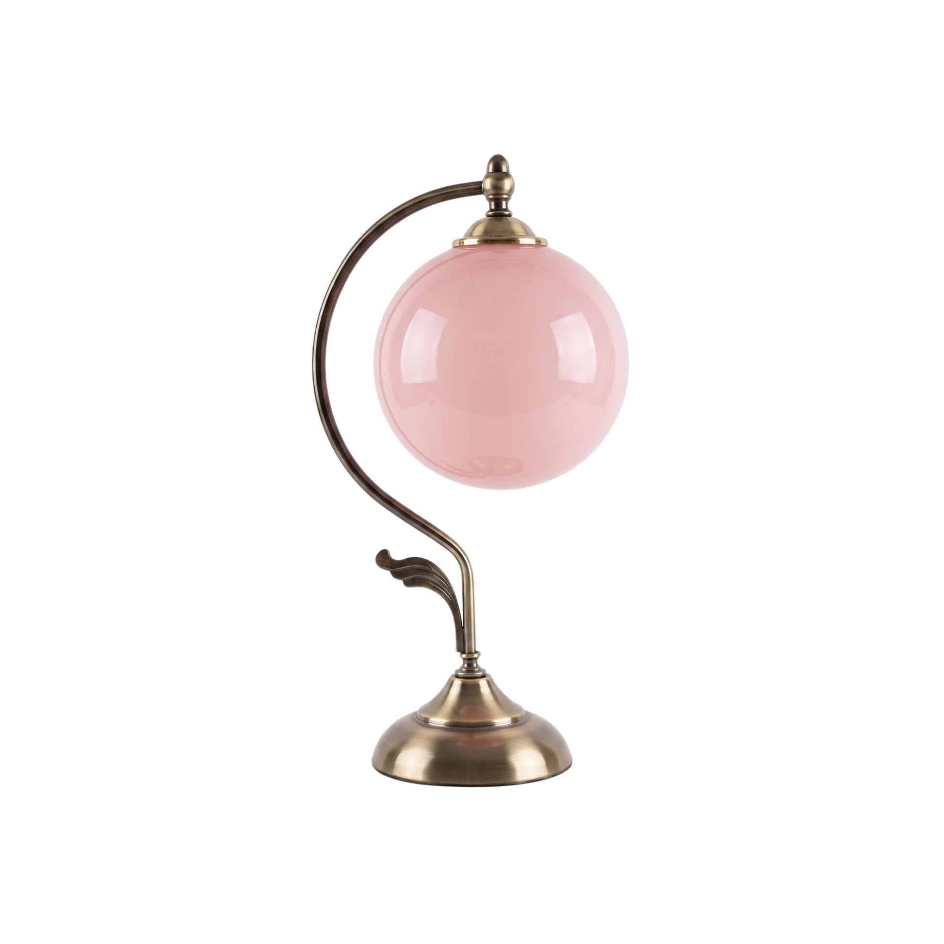 Evelyn Glass Table Lamp with a pink sphere and bronze-finished base.