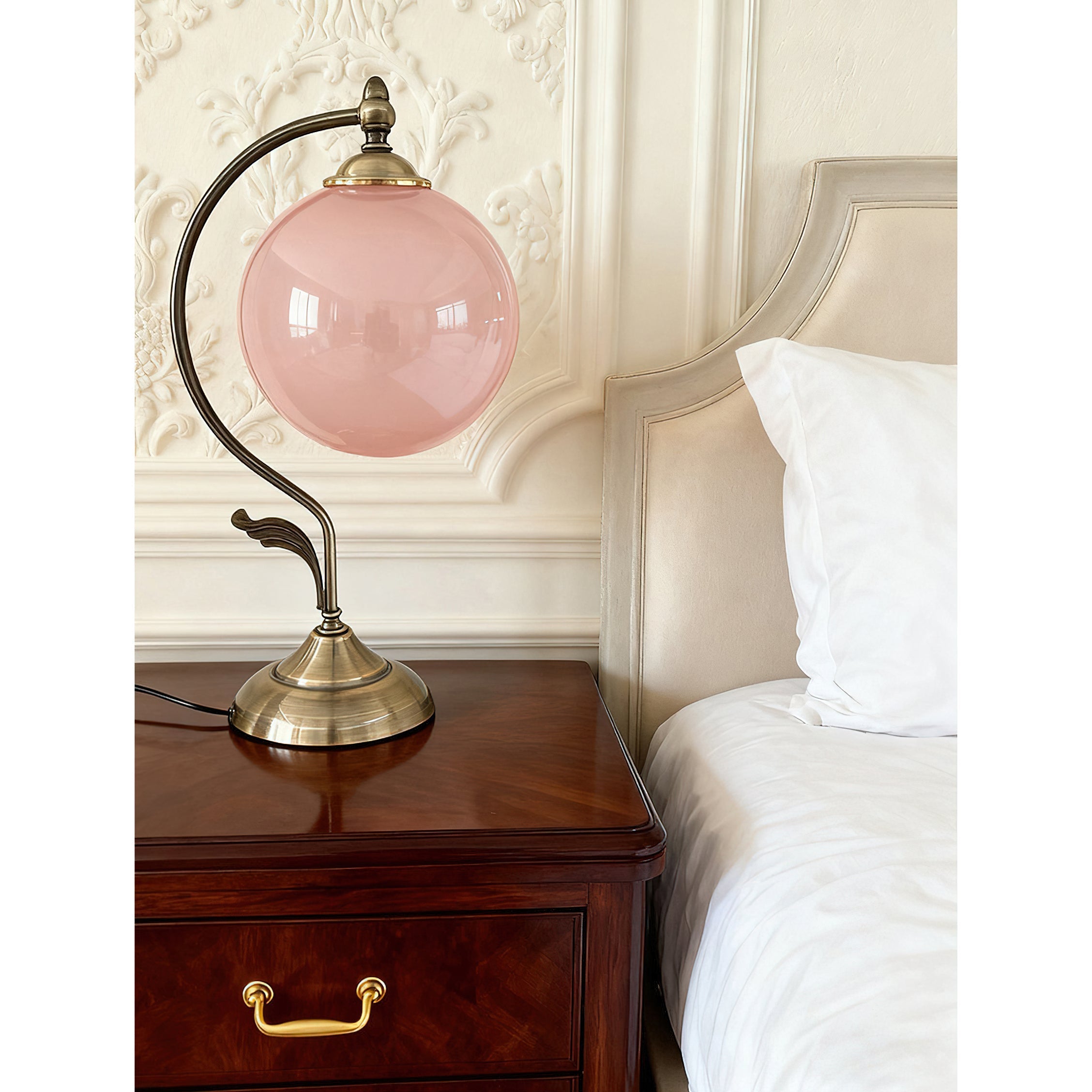 Evelyn Table Lamp with a white glass sphere.