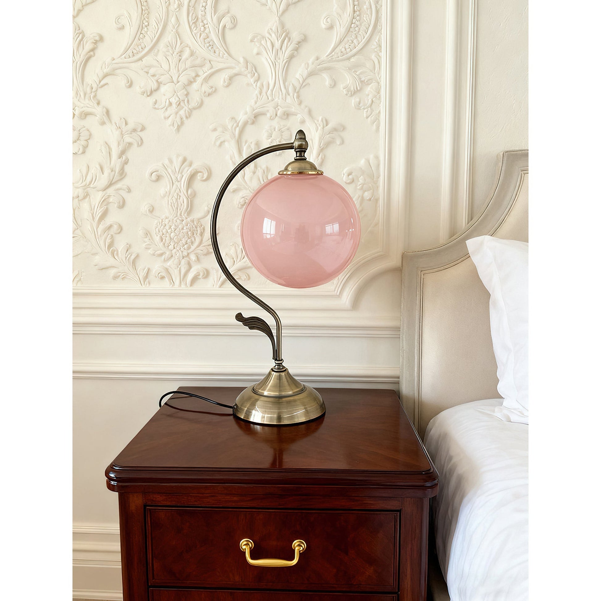 Evelyn Table Lamp with a blue glass sphere.