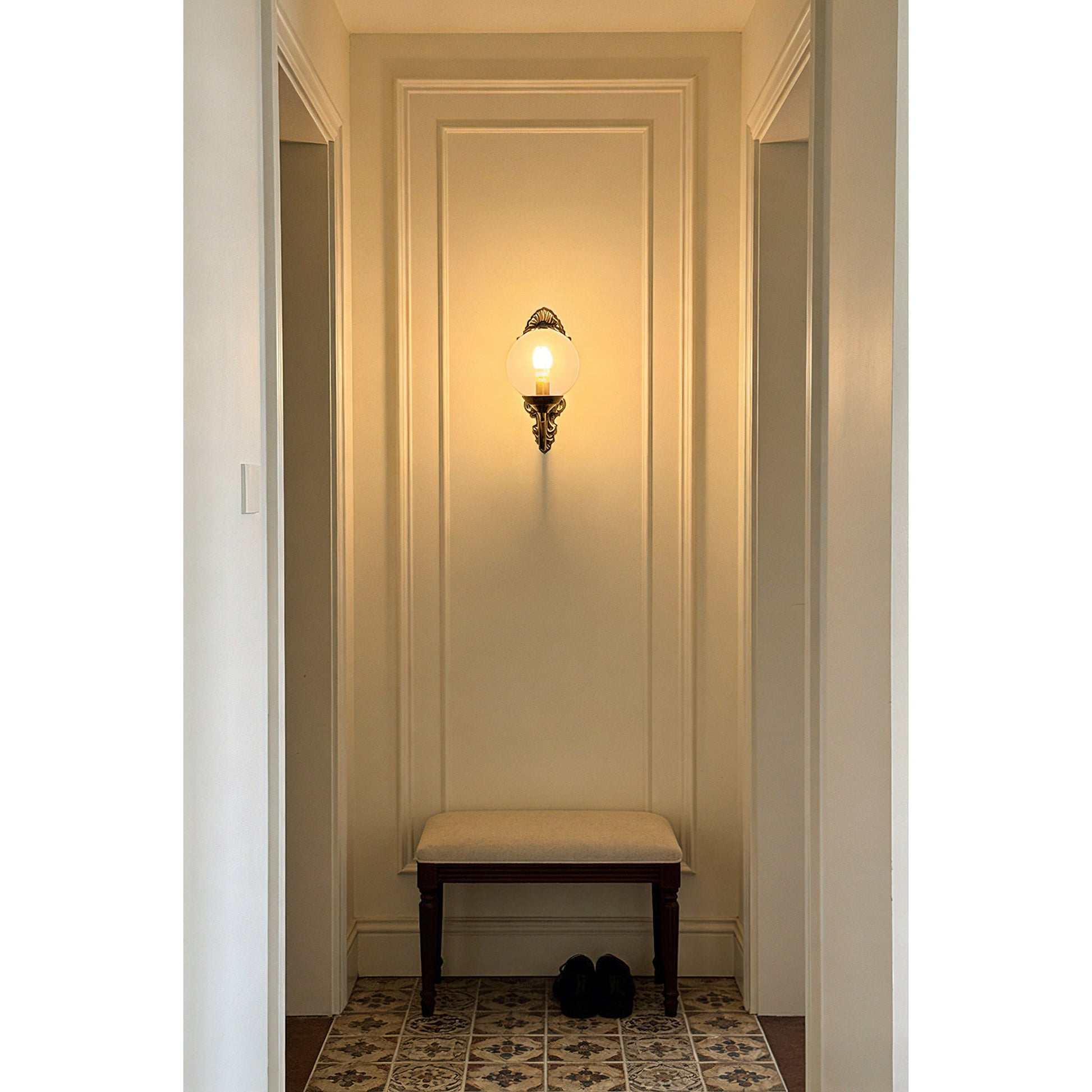 Unlit Evelyn Wall Lamp in clear finish on a white background.