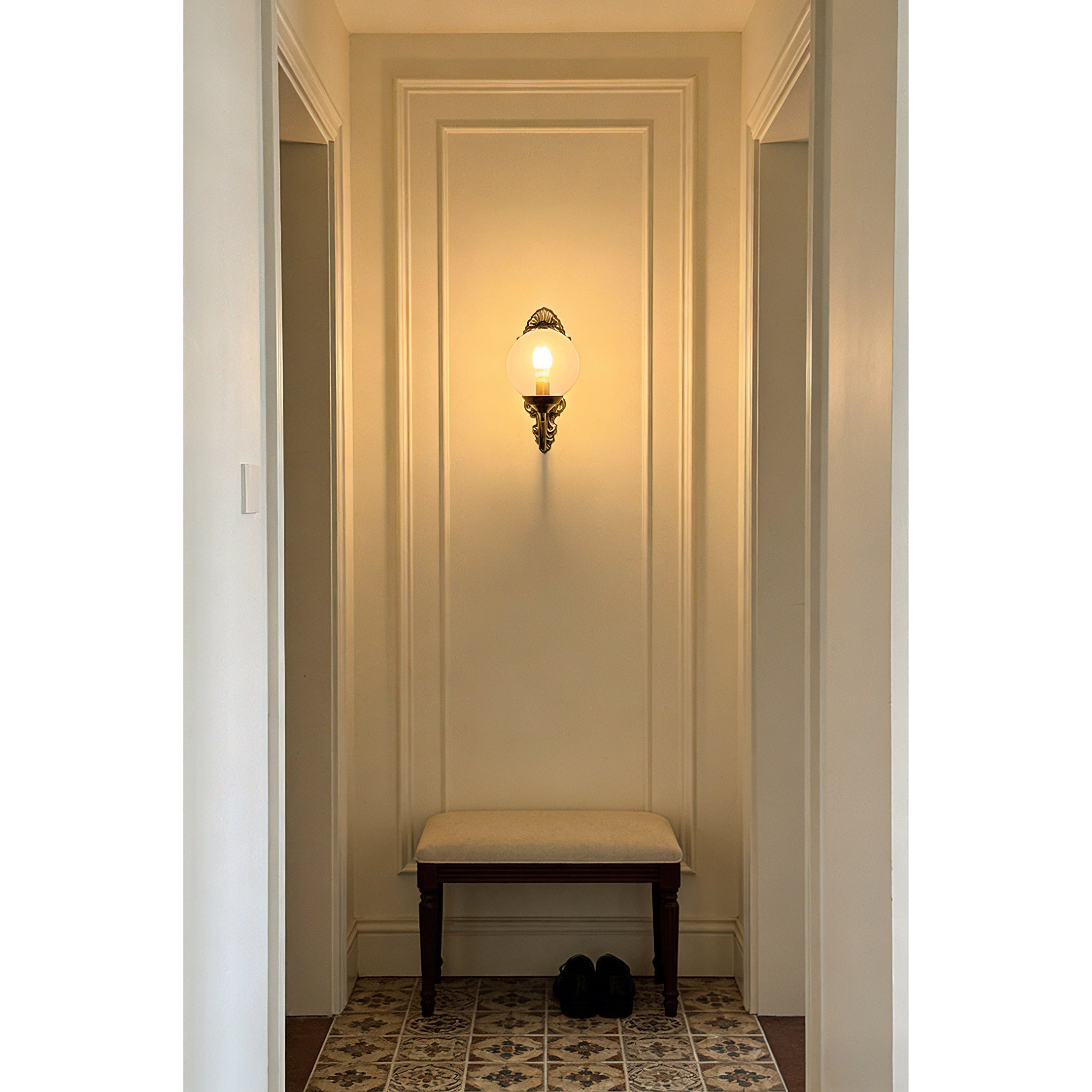 Unlit Evelyn Wall Lamp in clear finish on a white background.
