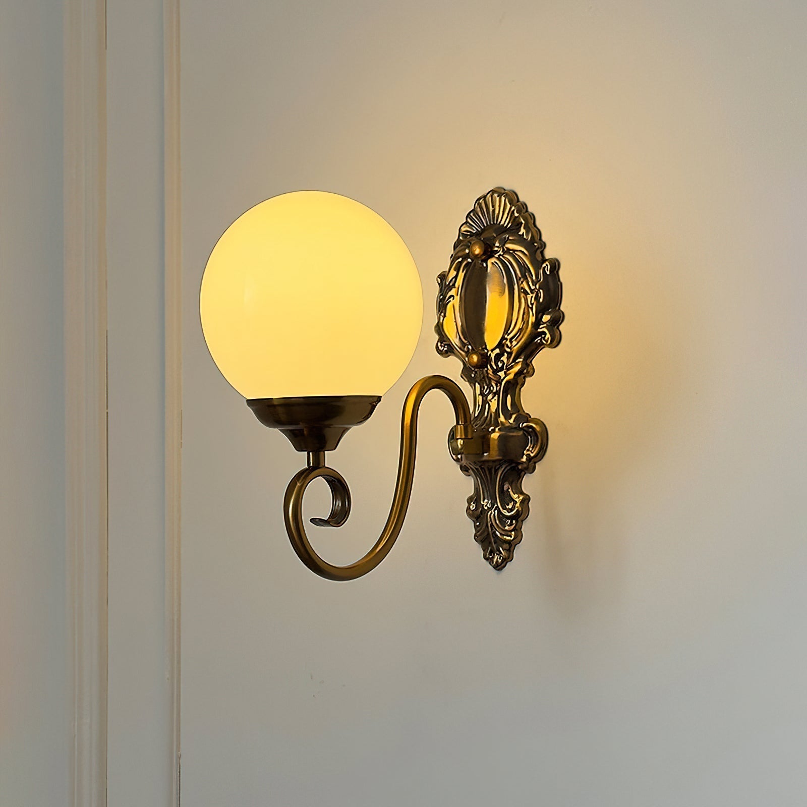 Detail of the light reflecting through the clear glass shade.