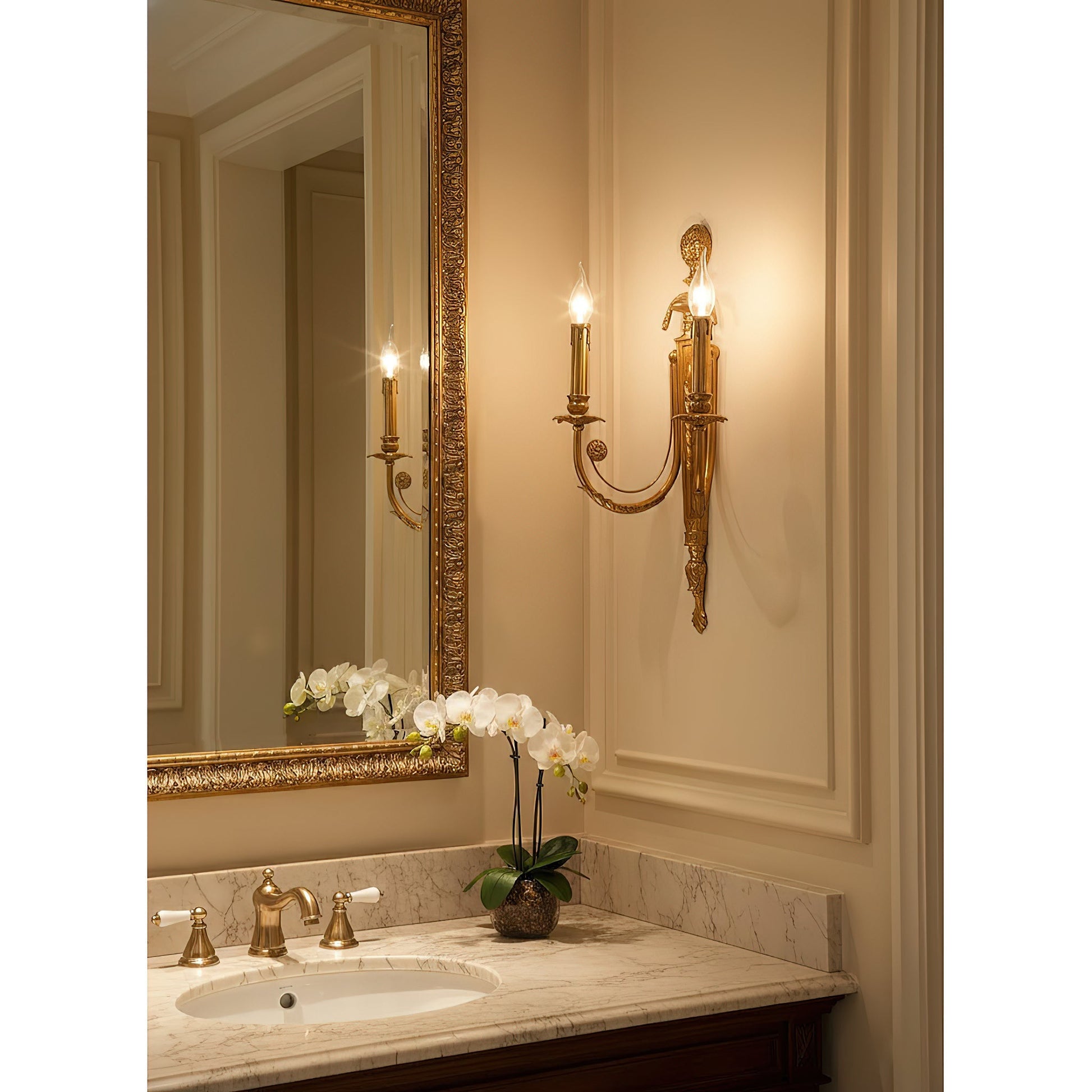 A pair of Fabienne Wall Lamps installed on either side of a large mirror.