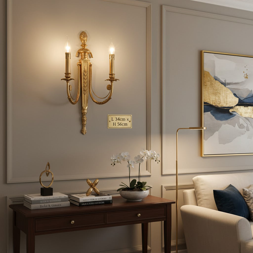 Detail shot of the ornate brass arm and decorative elements of the Fabienne Wall Lamp.