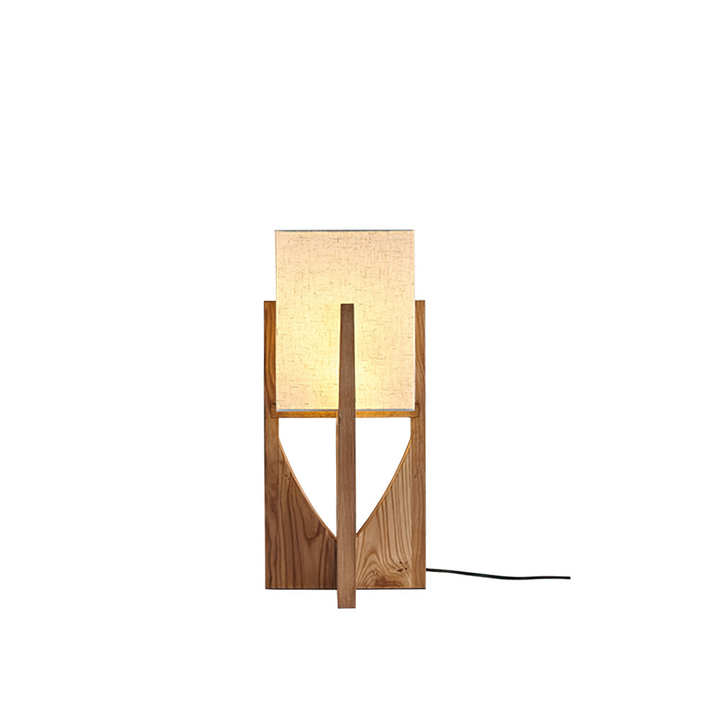 The Fairbanks Table Lamp displayed with its natural Wood color finish.