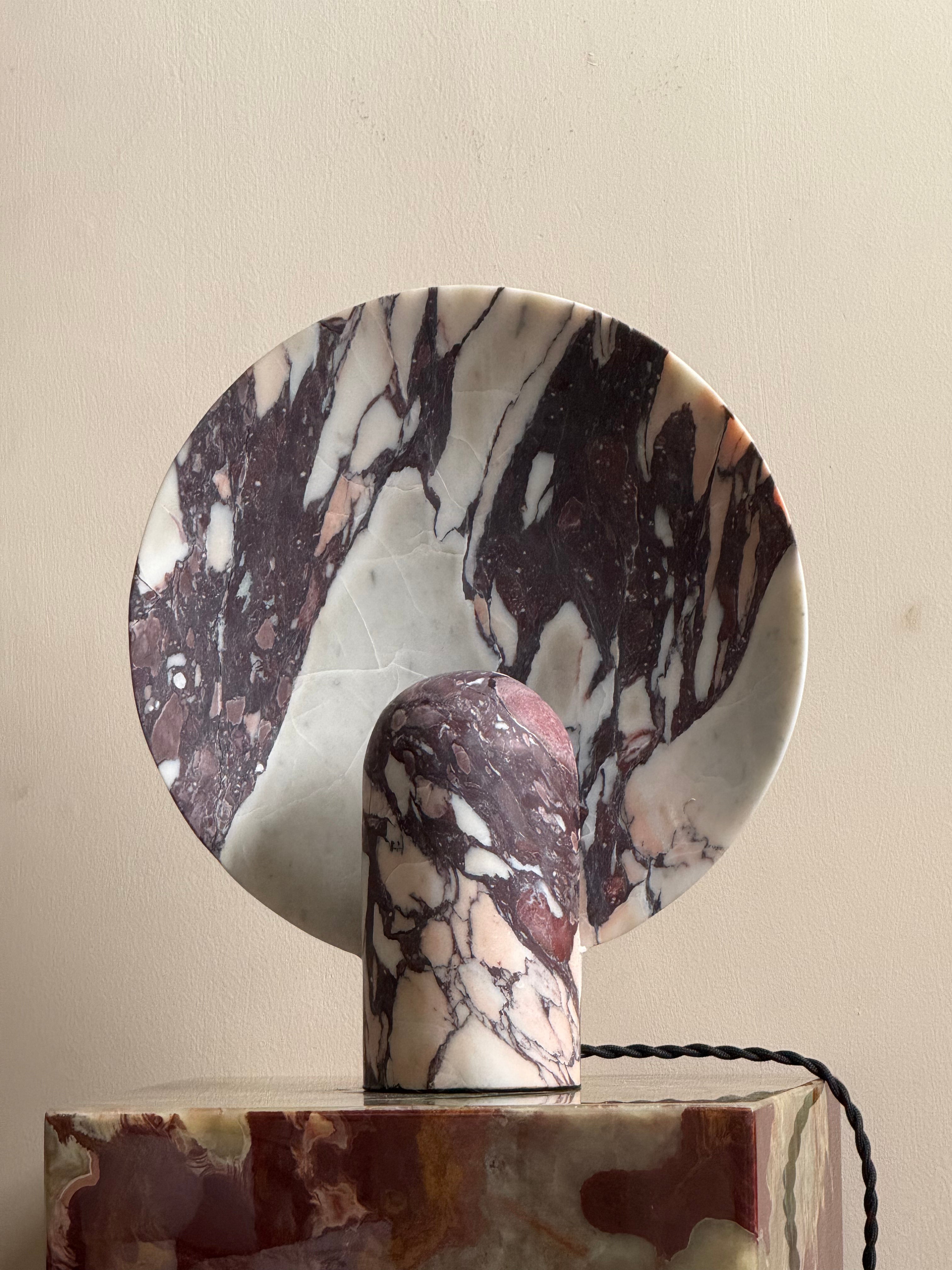 Fan Table Lamp in white marble, unlit.