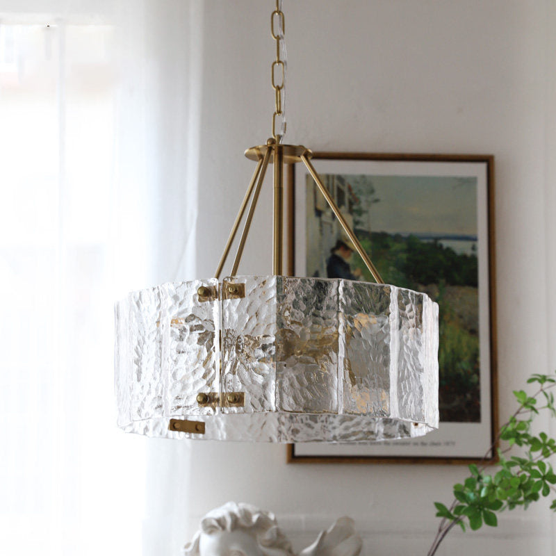 Side view of the Fenoullet Chandelier showcasing its gold frame and rippled glass.