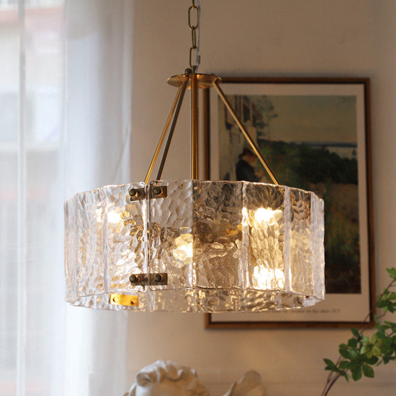 Fenoullet Chandelier casting a soft, rippling light pattern on a nearby wall.