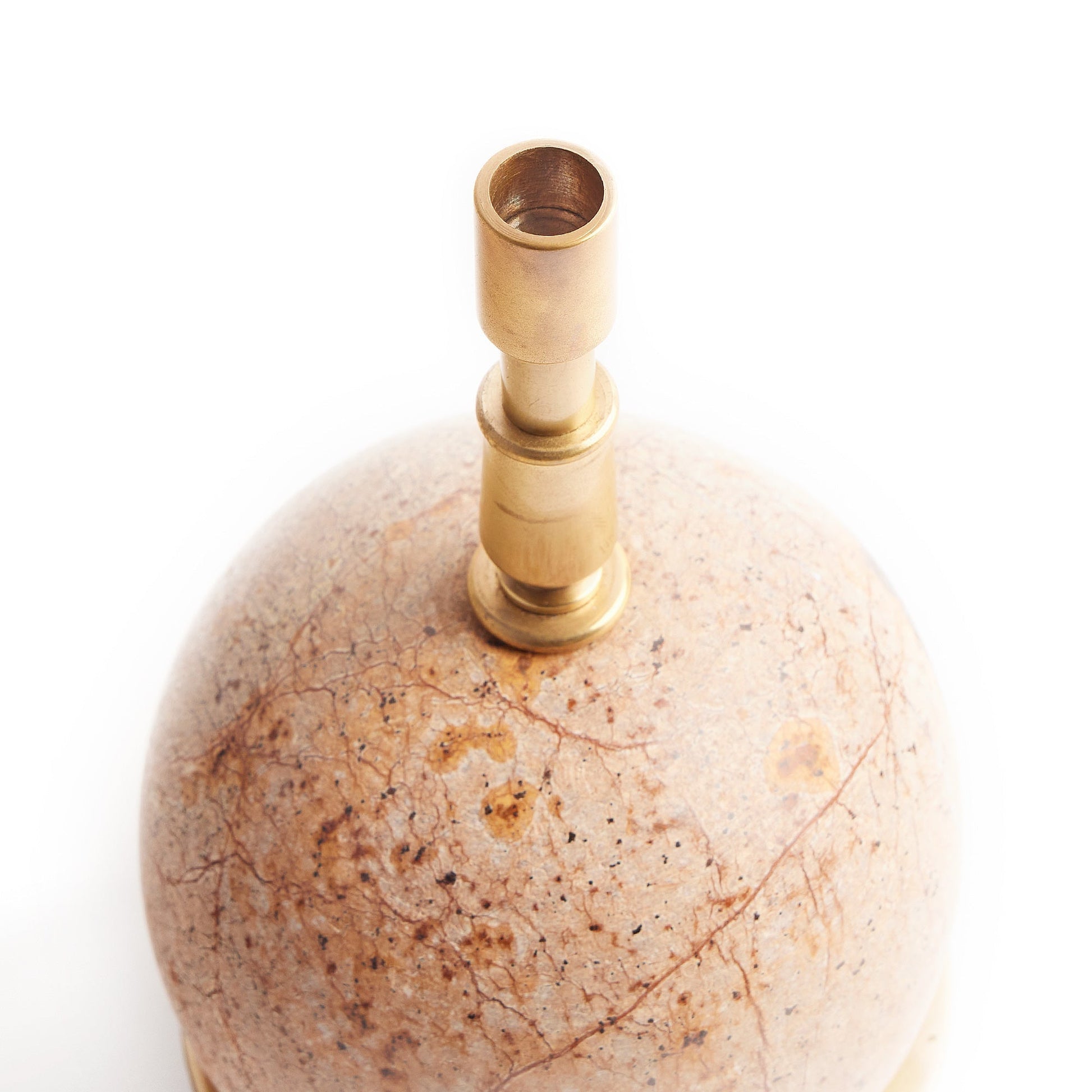 Angled view of the Ferdy Table Lamp highlighting its spherical form.