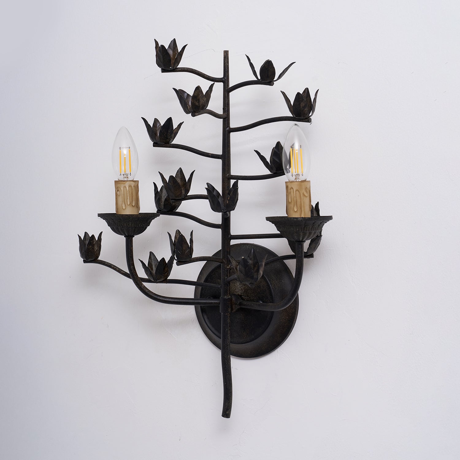 The lamp shown with vintage-style Edison bulbs (not included).