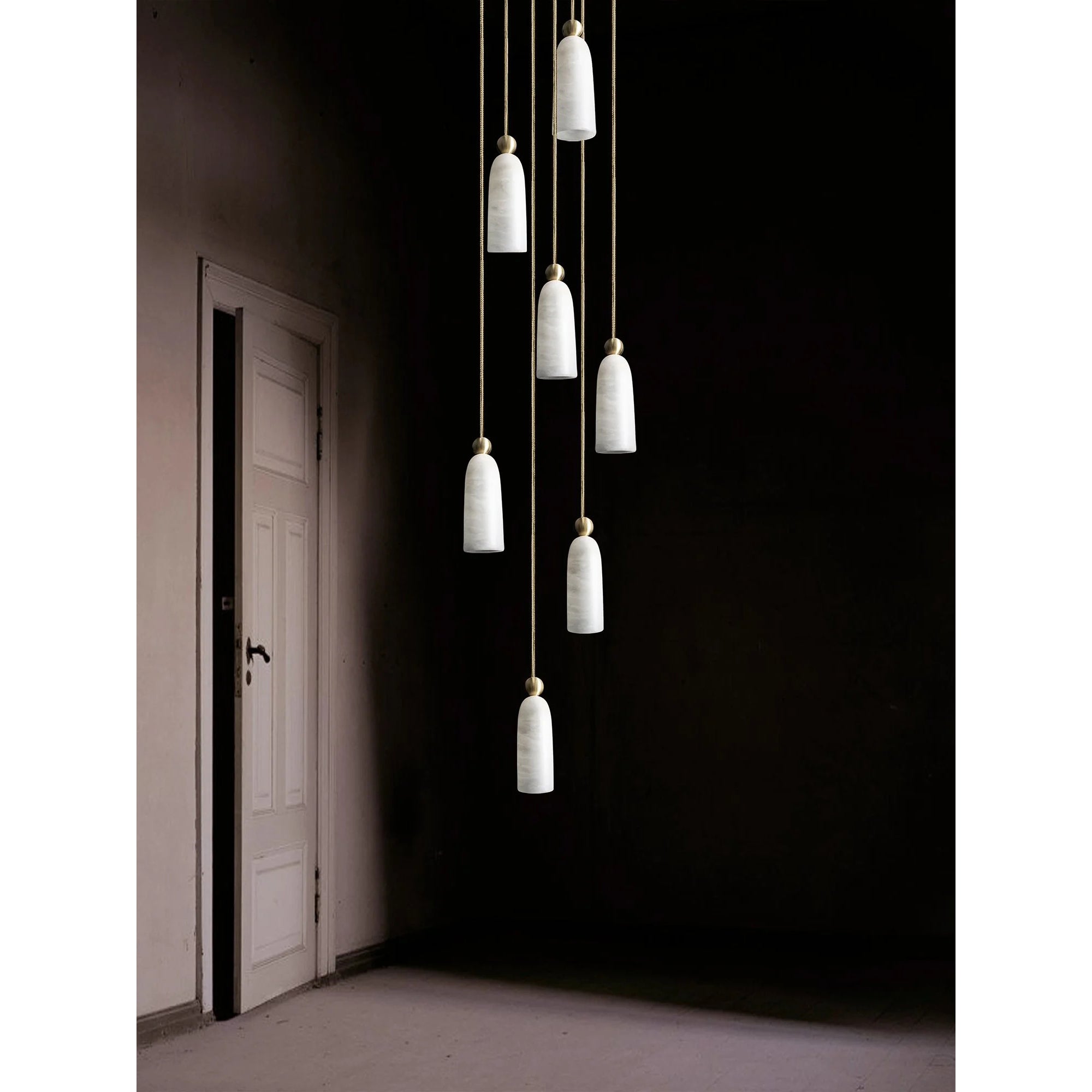 Angled view of the Figure Spanish Alabaster Pendant Light.