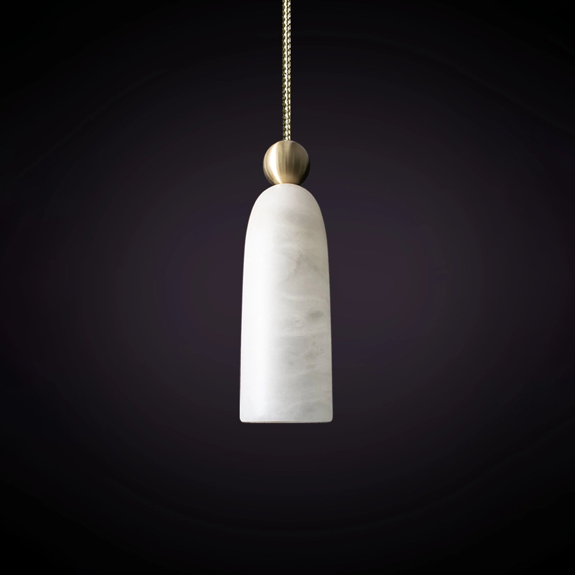 Top-down view of the brass cap and cord connection point.