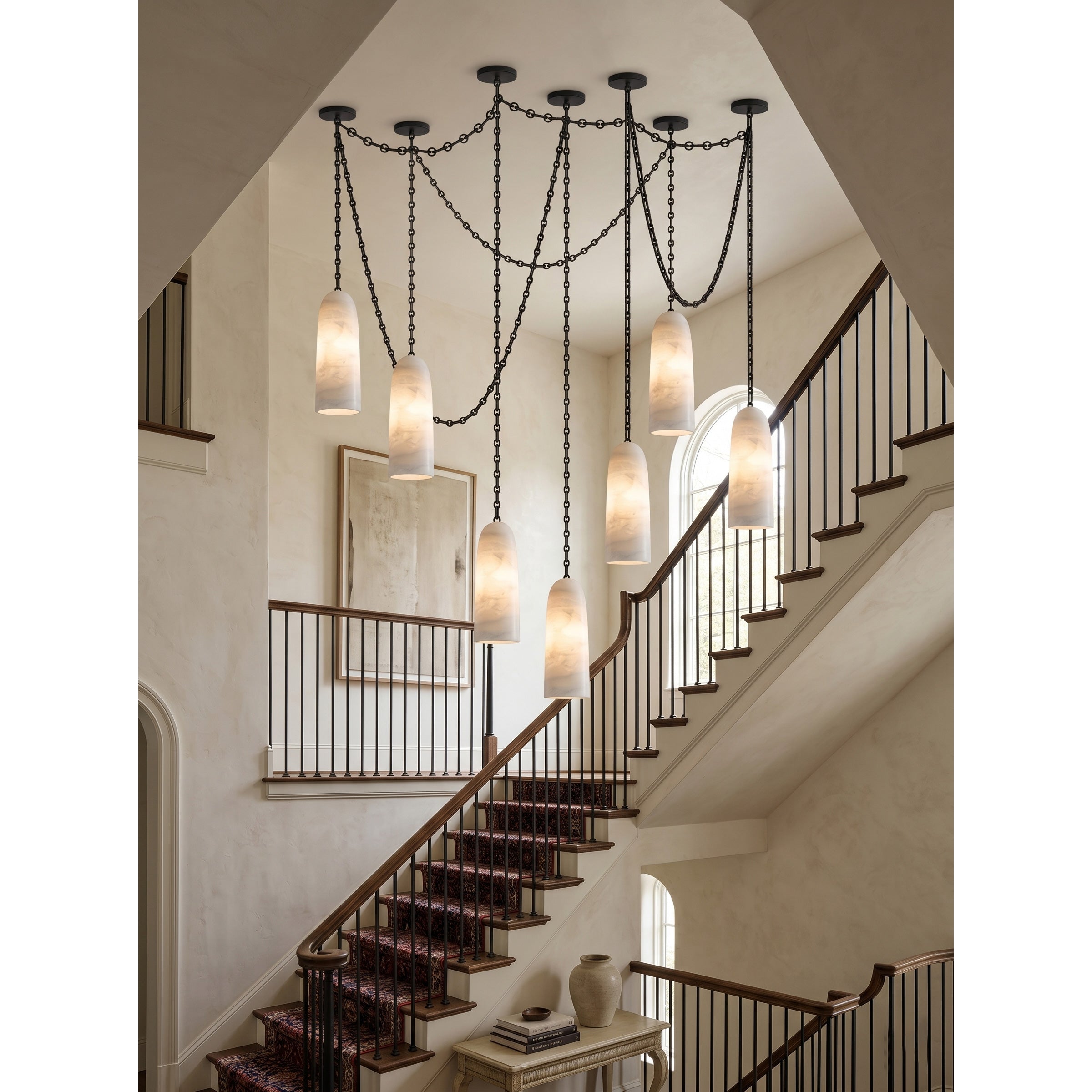 The chandelier shown in a rustic style home.