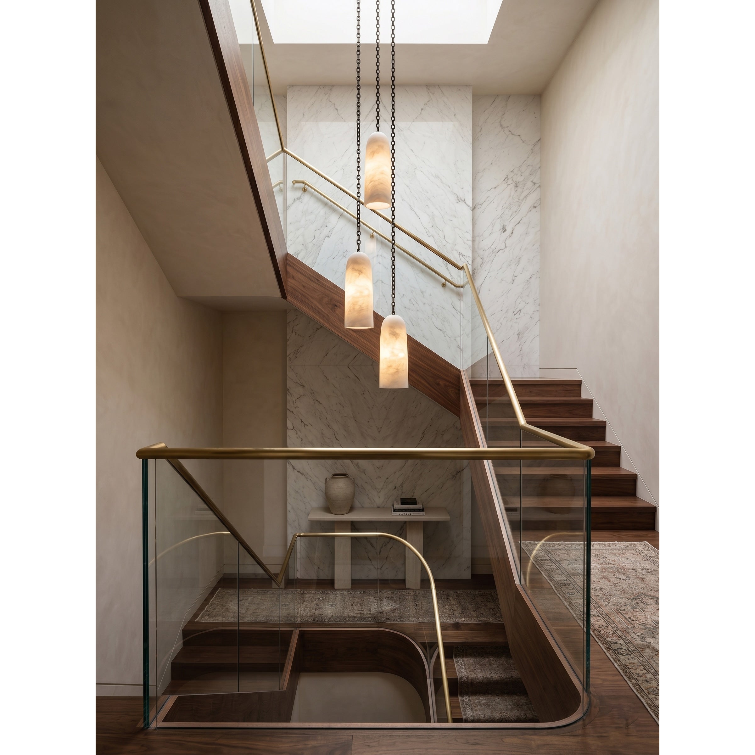 The chandelier shown in a modern farmhouse setting.