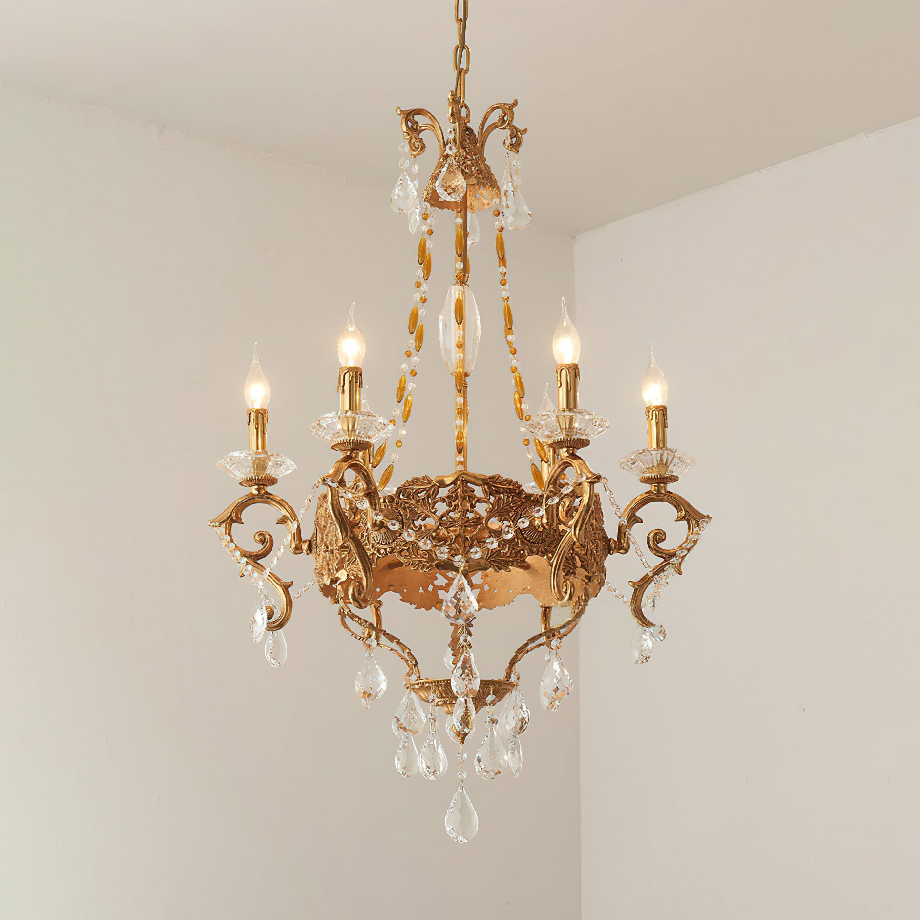 Filmore Chandelier as a focal point in a high-ceiling dining room.