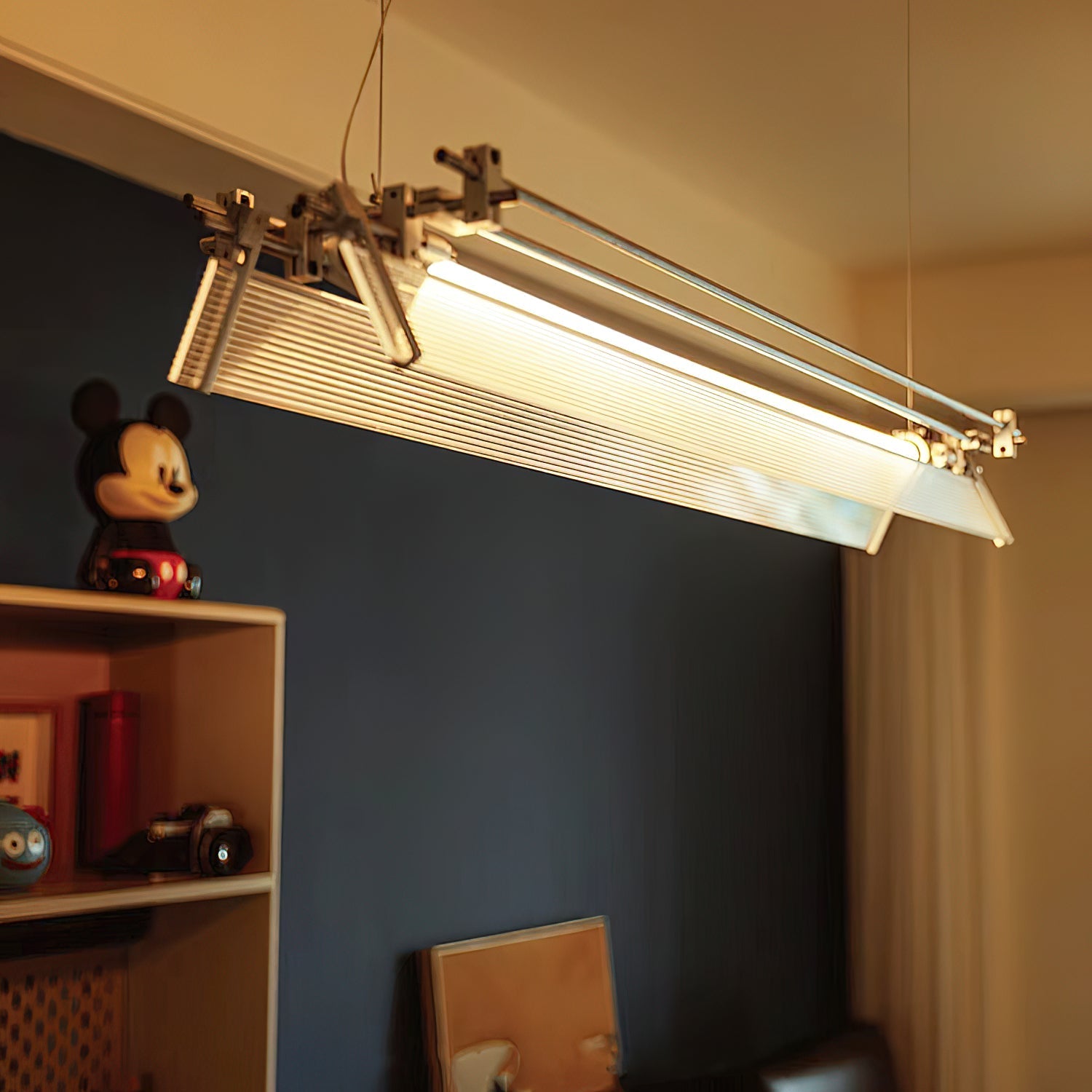 Close-up view of the Filtro LED Pendant Lamp's glass and aluminum body.