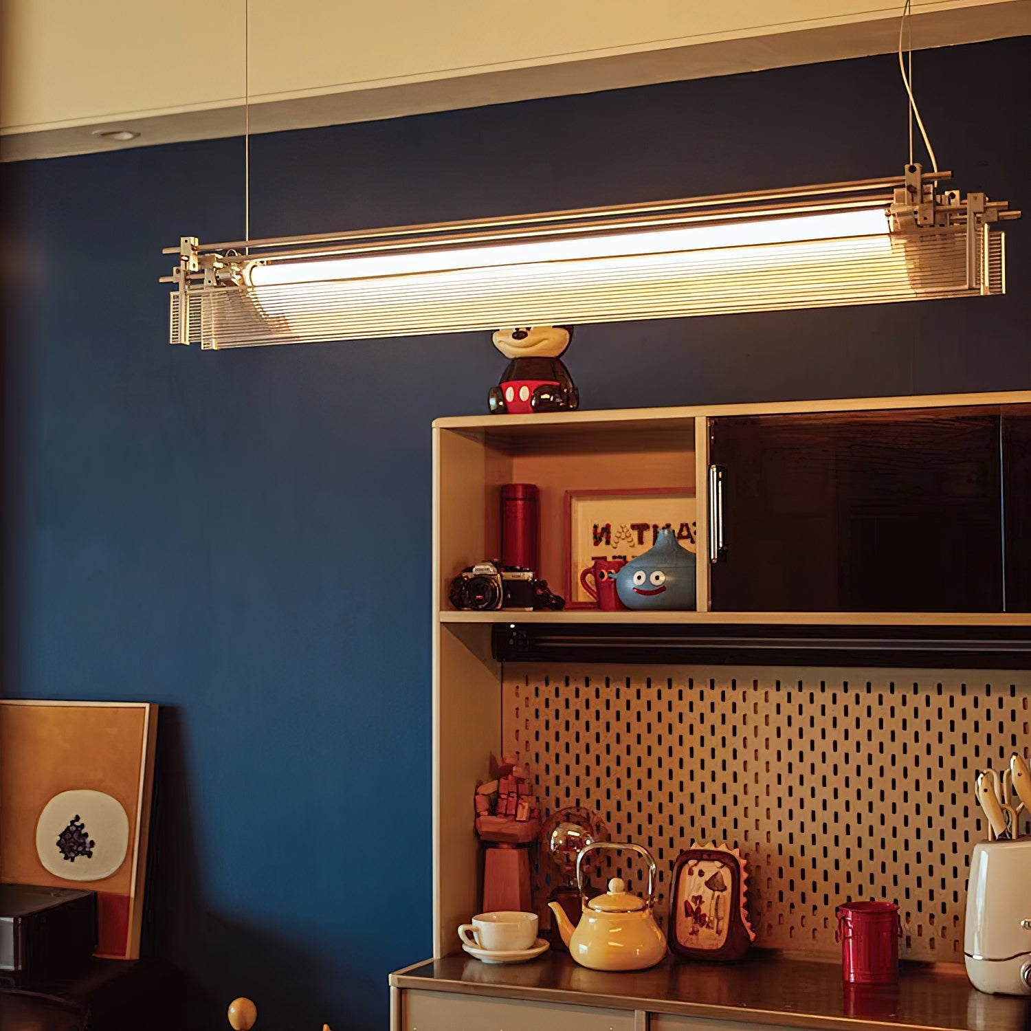 Angled shot of the silver Filtro LED Pendant Lamp, highlighting its sleek design.