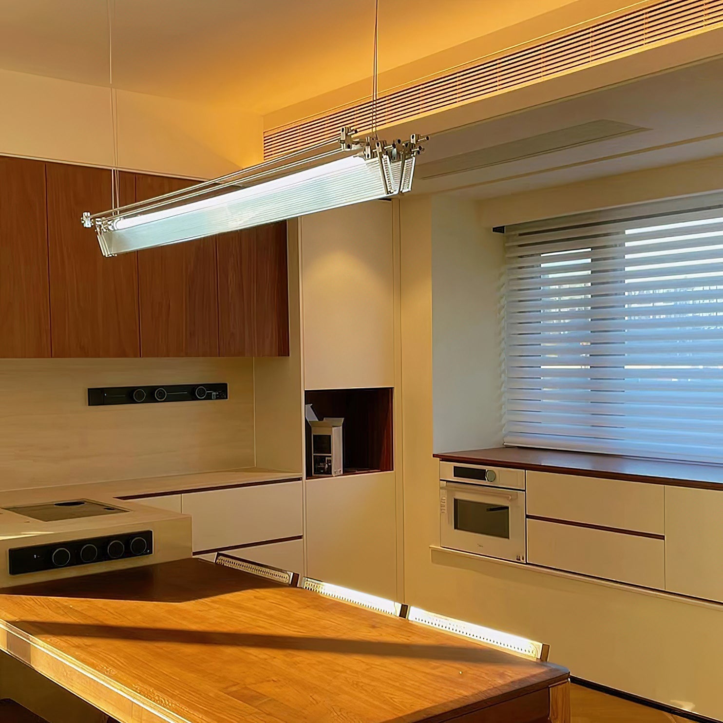 Filtro LED Pendant Lamp illuminating a kitchen island.