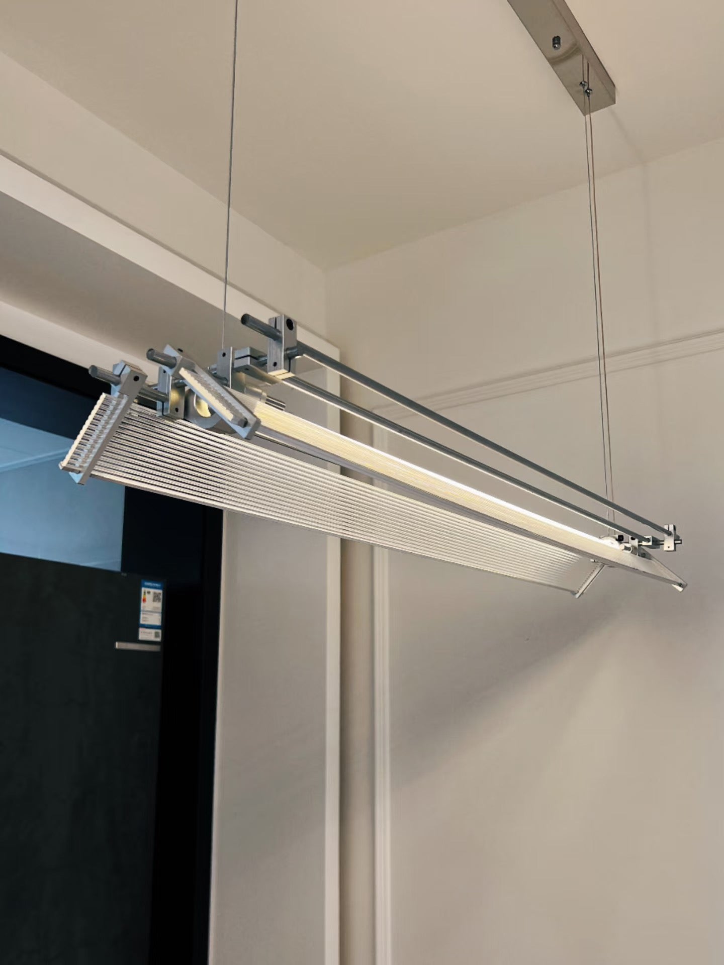 A pair of Filtro LED Pendant Lamps installed in a commercial space.
