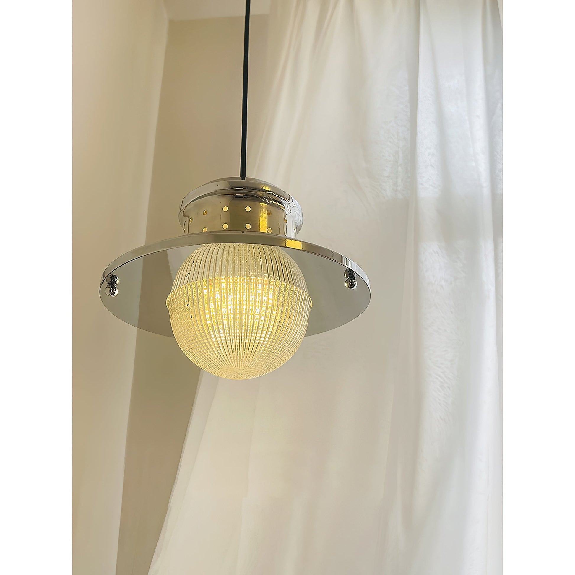 The Fisherman's Pole Pendant Lamp shown illuminated, casting a warm glow.