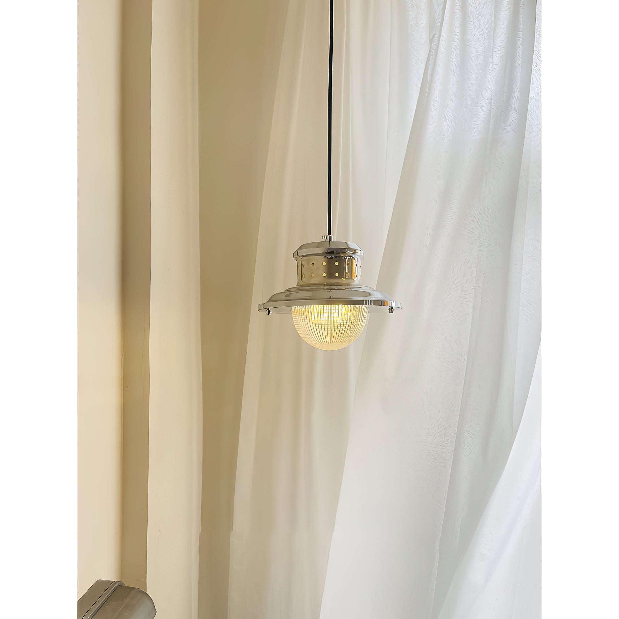 Fisherman's Pole Pendant Lamp displayed in a modern living room setting.