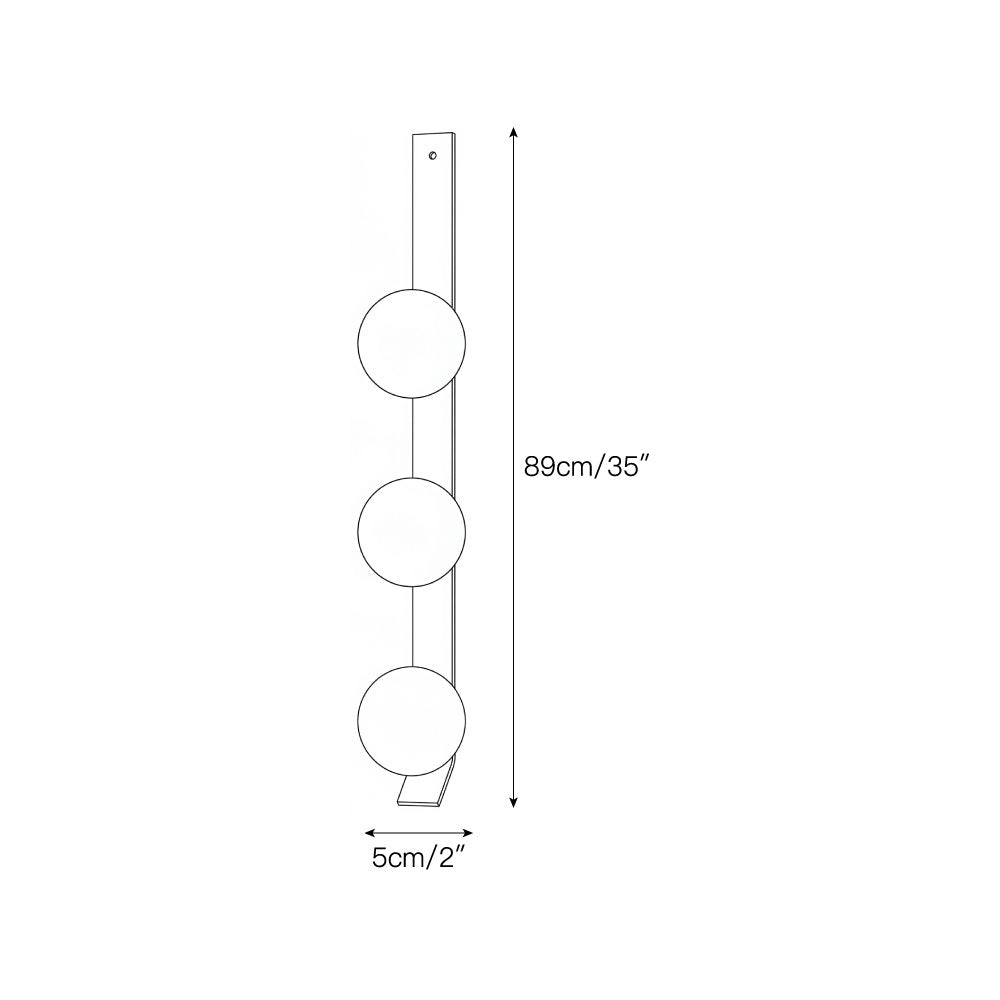 The warm, soft light emitted from the alabaster shade when the sconce is on.