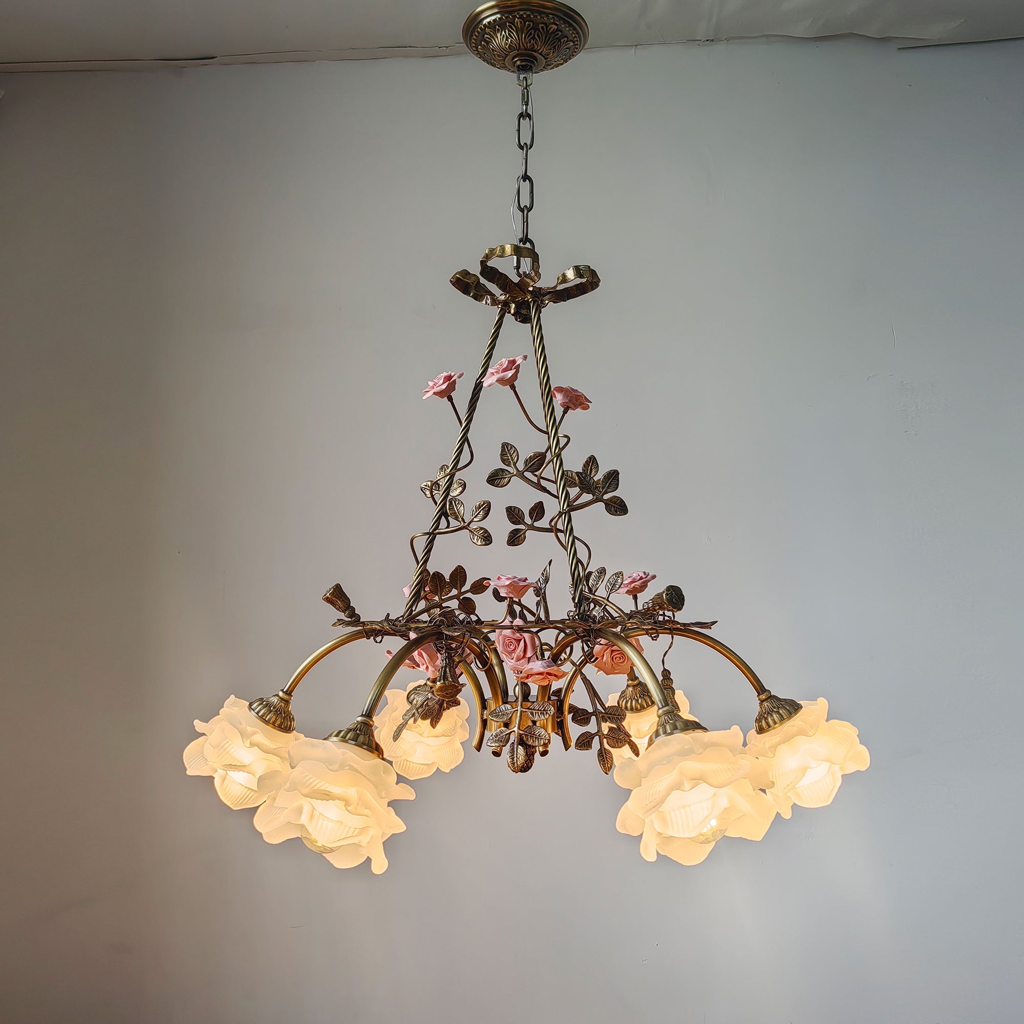 Flora Blossom Chandelier with pink ceramic flowers.