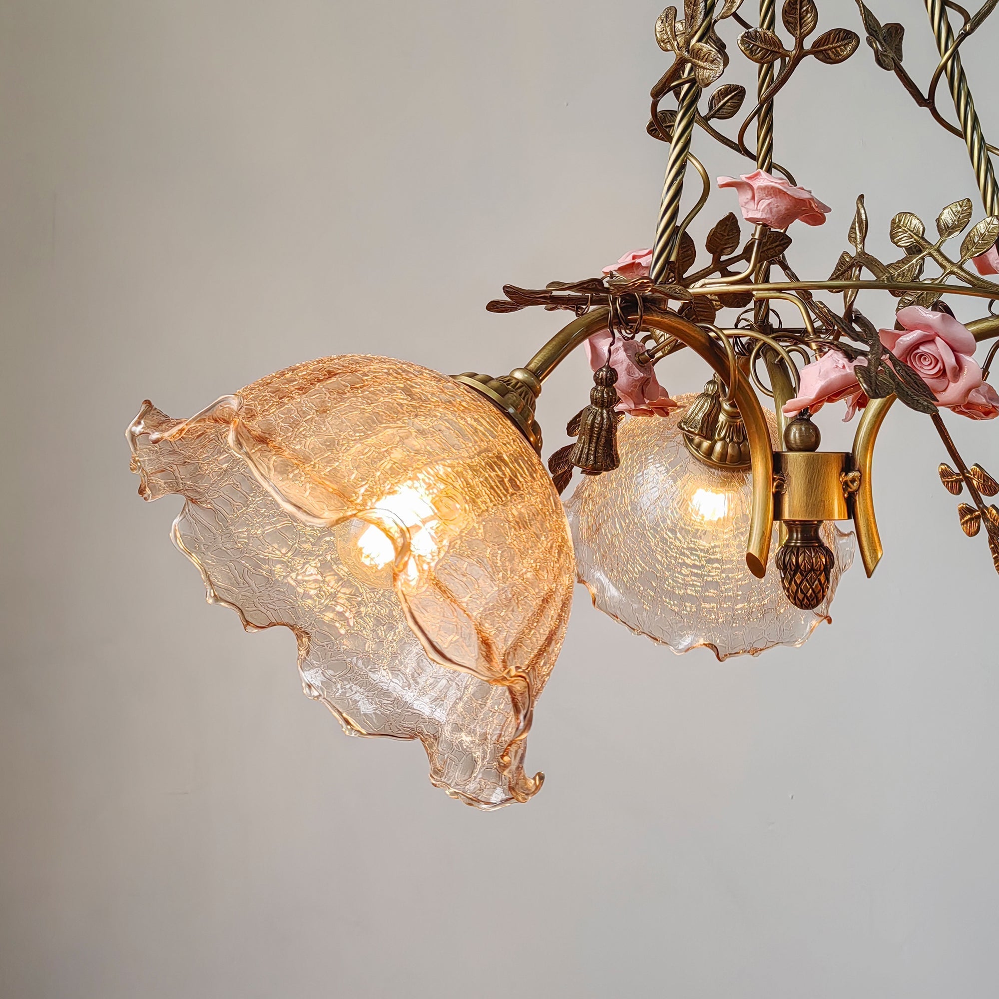 The Flora Blossom Chandelier in an antique bronze finish.