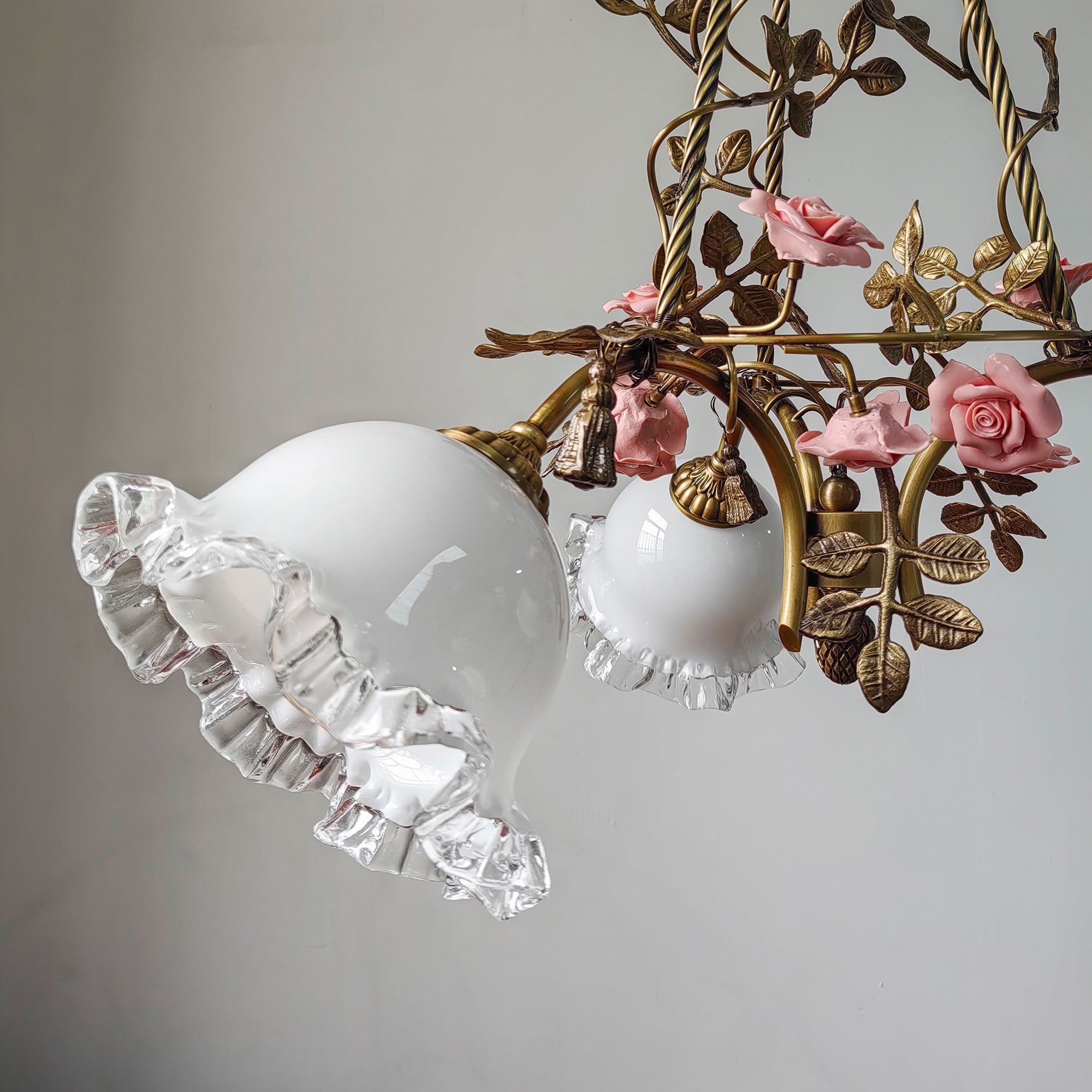 Close-up of the ceramic flower detail on the Flora Blossom Chandelier.