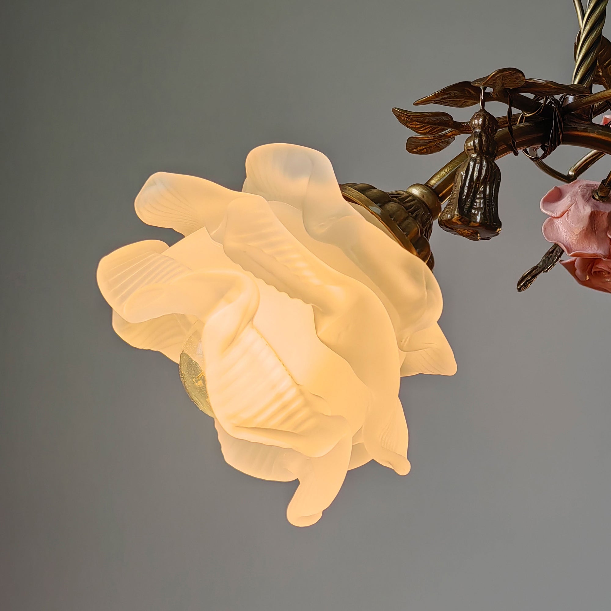 Overhead view of the Flora Blossom Chandelier's canopy and brass body.