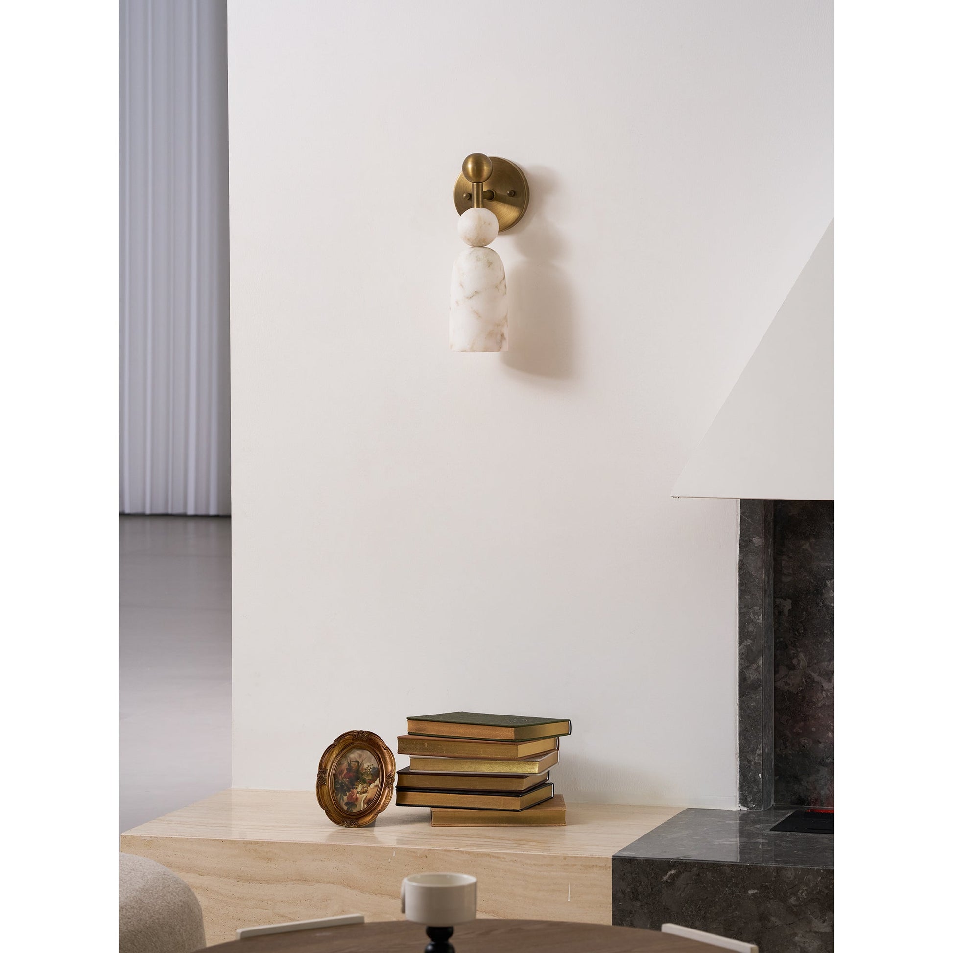 Installation of the Flume lamp in a sophisticated entryway.