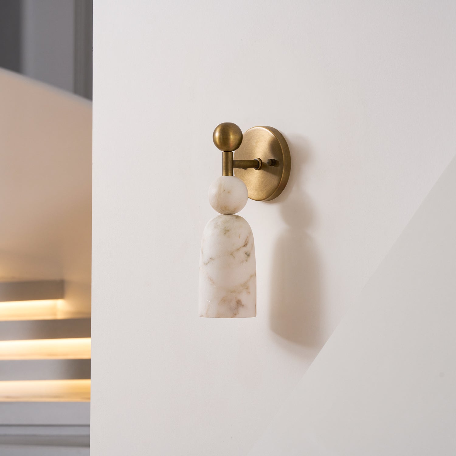 Lifestyle image of the lamp providing warm ambient light in a room.