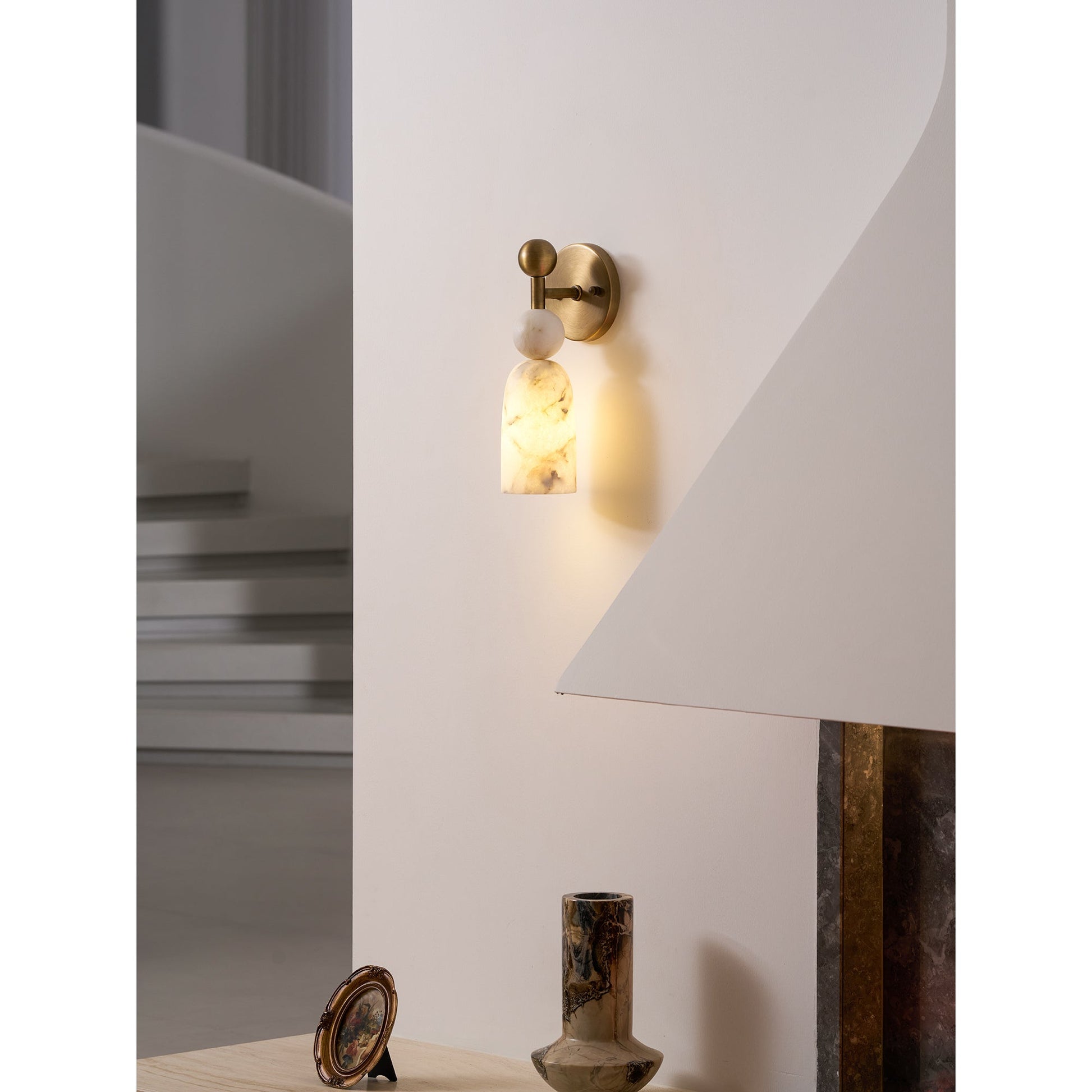 Low-angle shot emphasizing the lamp's vertical, sculptural form.