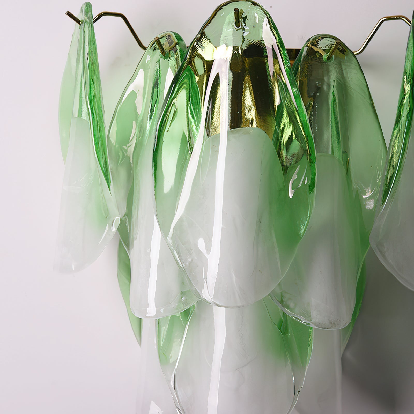 The different color options for the Foliage Wall Sconce: pink, green, white.