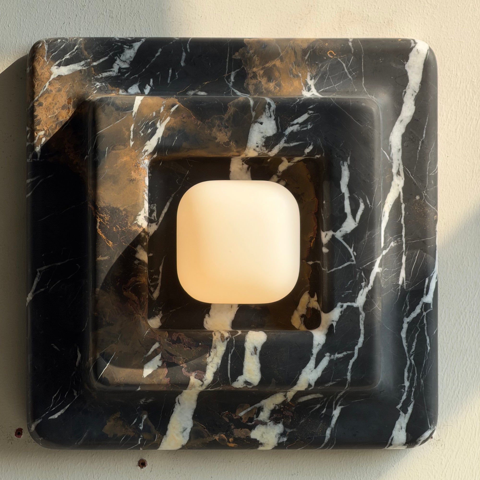 Back view of the lamp showing the mounting hardware and socket.