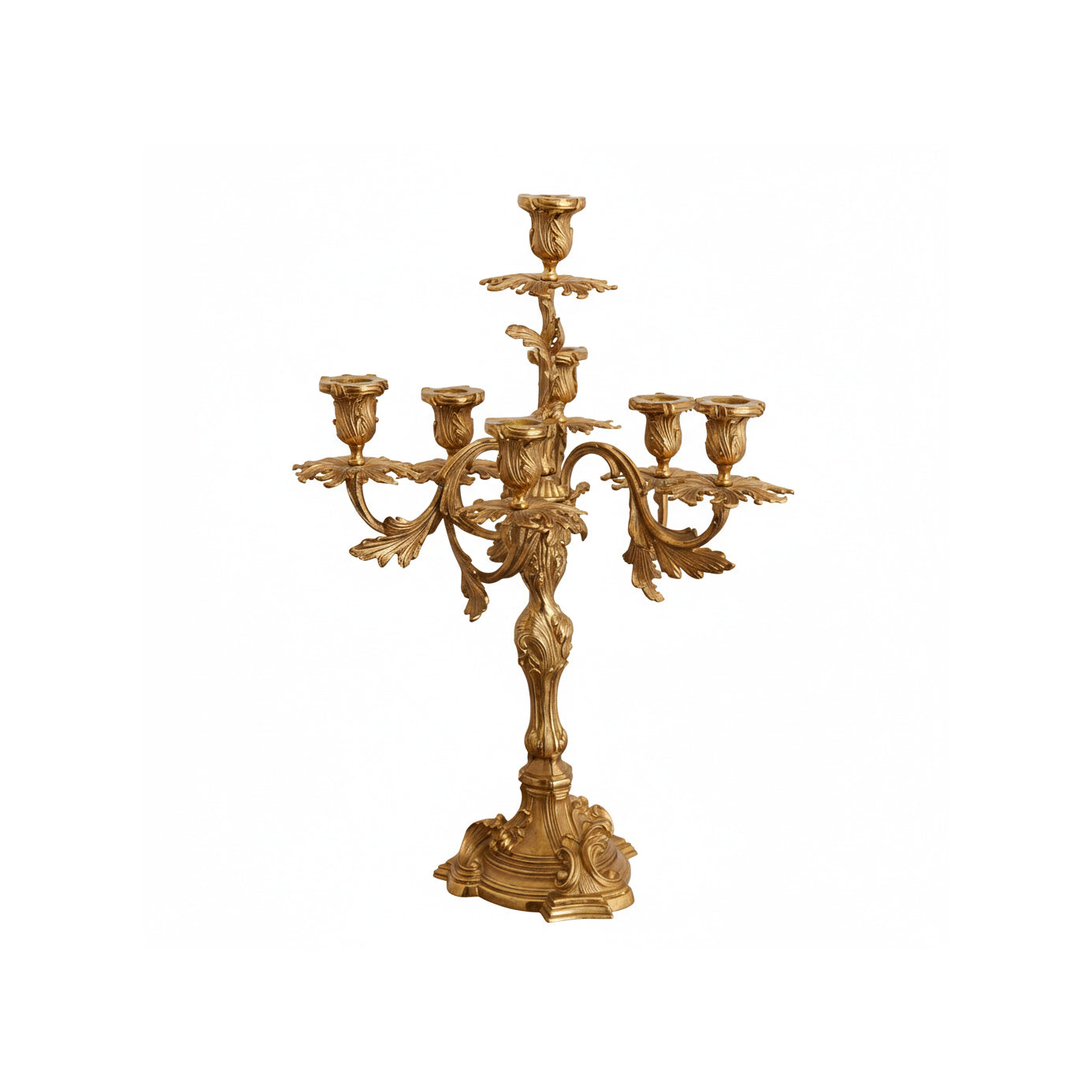 French brass seven-light candelabra on a neutral background.