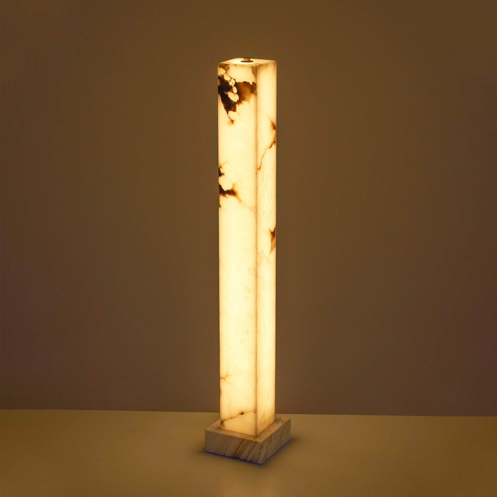 The lamp turned off, showing the natural alabaster stone.
