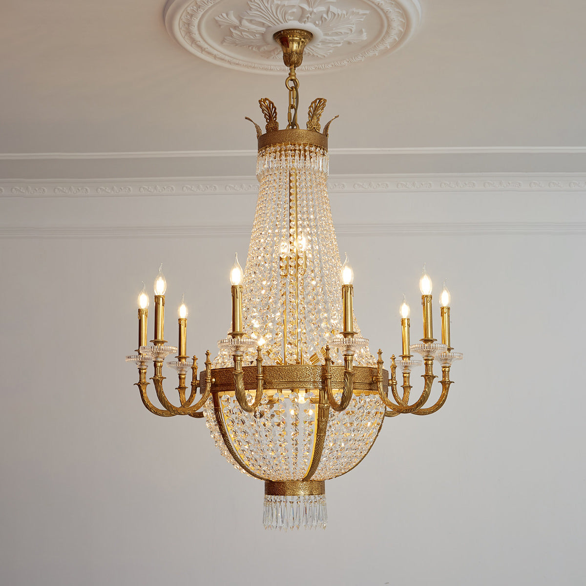 Close-up of an E12 candelabra socket on the chandelier arm.